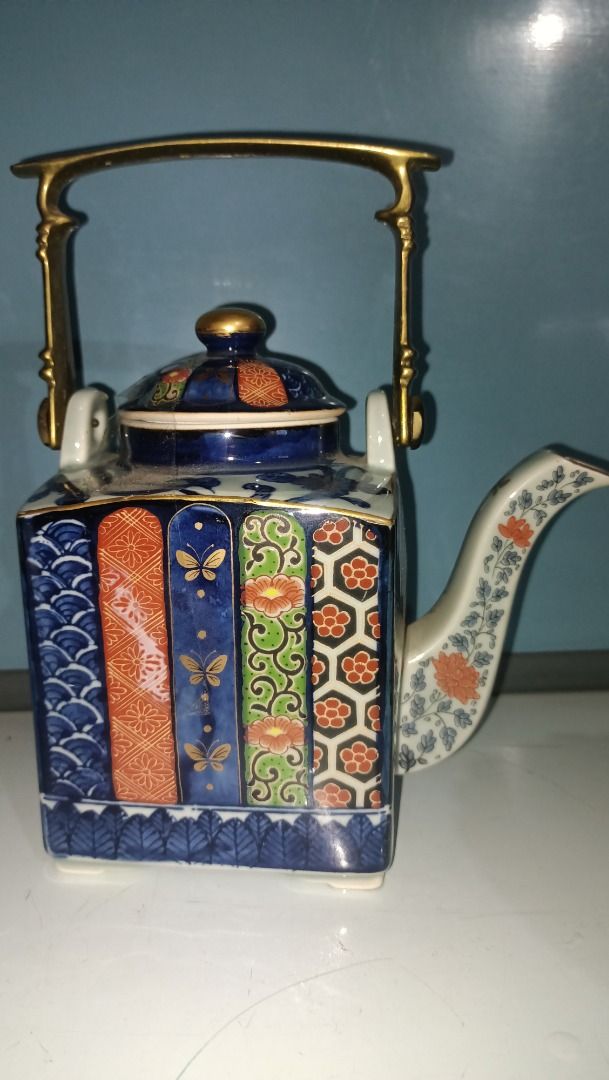Miyako Imari Ware Tea pot with Brass Handle (Category: Dinnerware & Cutlery) located in Munoz. Submitted by larryc1212 (Listing ID 1420895571, Image 2). Description: - Miyako Imari Ware teapot. - Features a brass handle. - Showcases a detailed and colorful design. - Ideal for display or tea service. - Perfect for Collectors Item may include some scratches due to age, as is were is basis Item can be pick up in our Japan surplus shop located in Mun