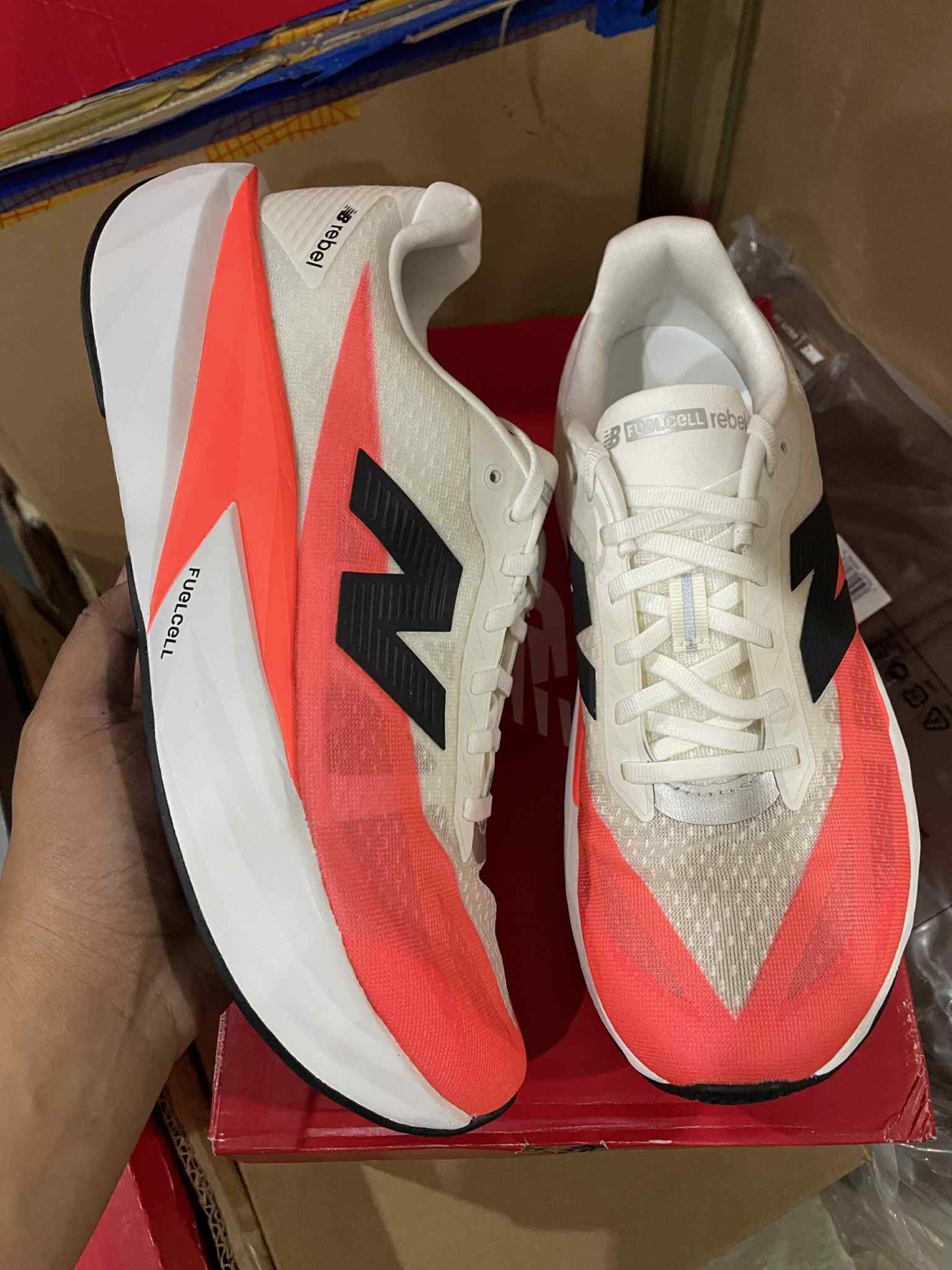 New Balance Revel V5 9.5 (Category: Sneakers) located in Manila. Submitted by tachipedia (Listing ID 1420916400, Image 1). Description: - New Balance Revel V5 - Size: US 9.5 - Condition: Used (5km mileage) - Comes with original box - Striking white and coral colorway - Negotiable.