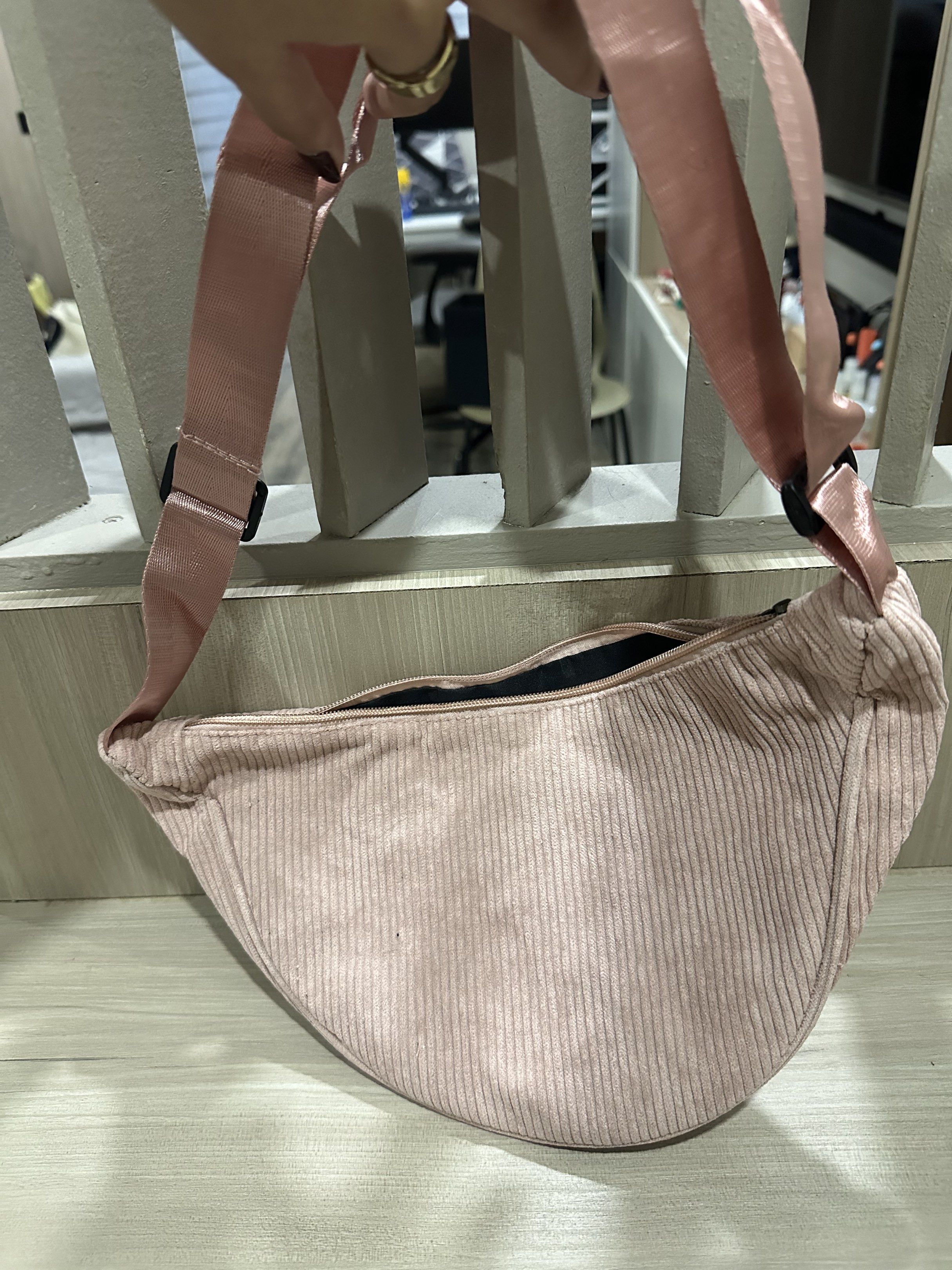 Pink Corduroy Sling Bag (Category: Cross-body Bags) located in Manila. Submitted by bellevd (Listing ID 1420838895, Image 3). Description: - Brand new pink corduroy sling bag - Stylish curved design - Features a matching pink strap - Comes in original packaging - Unused and in perfect condition MOP: Gcash, BPI, GoTyme (No cash payments).