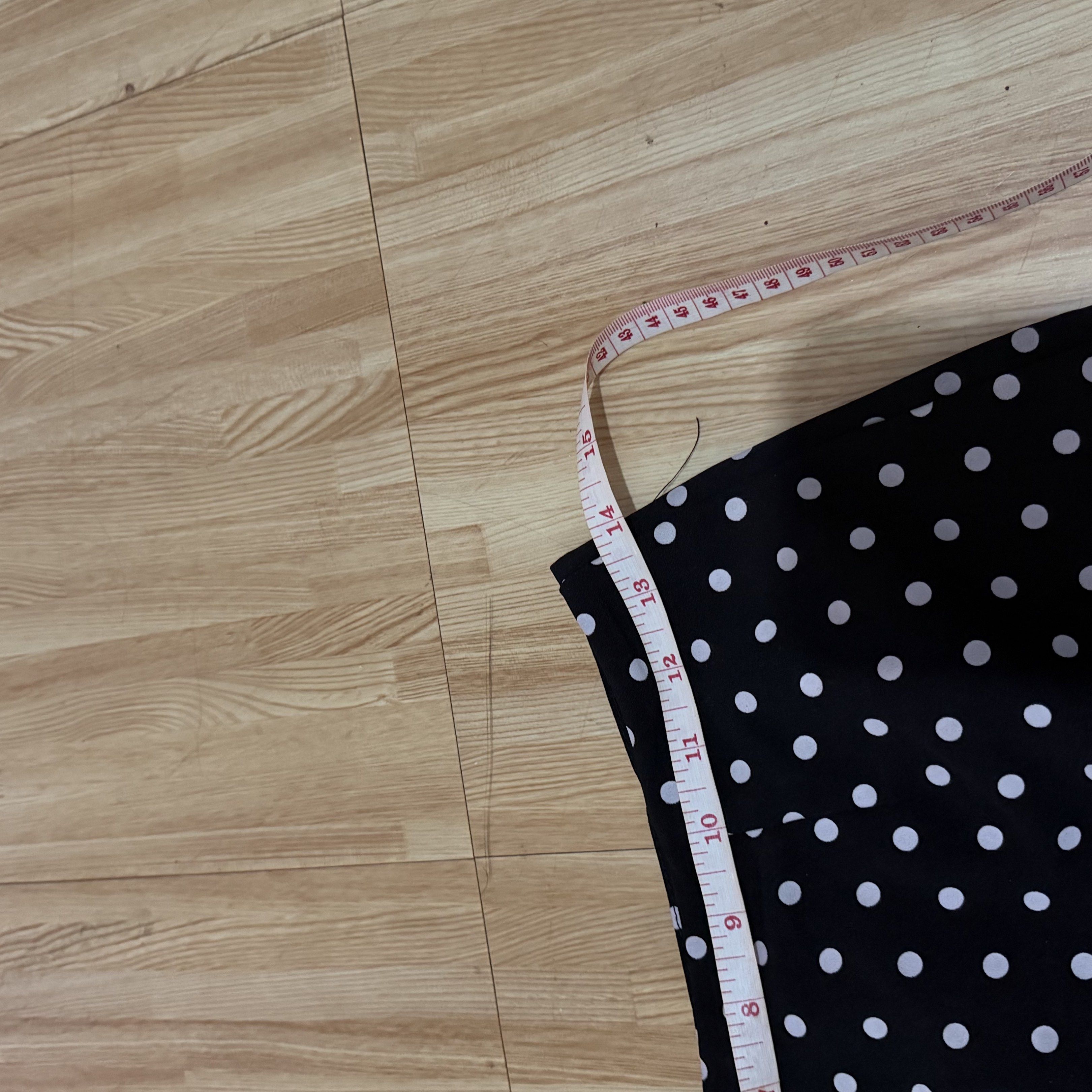 Polka Dot Skort (Category: Skirts) located in Pasig City. Submitted by decluttertrends (Listing ID 1420768484, Image 3). Description: - Black skirt with white polka dots - Features a lining - Waist: Approximately 14 inches across - Length: Approximately 15 inches - Side zipper closure - Classic and versatile design.
