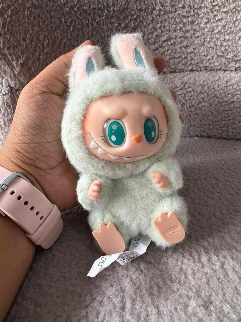 Popmart Labubu The Monsters Bunny Plush (Category: Plushies & Soft Toys) located in Caloocan City. Submitted by dyubella (Listing ID 1420751977, Image 2). Description: Popmart Labubu plush toy (Authentic) - From The Monsters series - Mint green fur suit - Includes the original tag - Soft and huggable plush - Perfect for collectors or gifts.