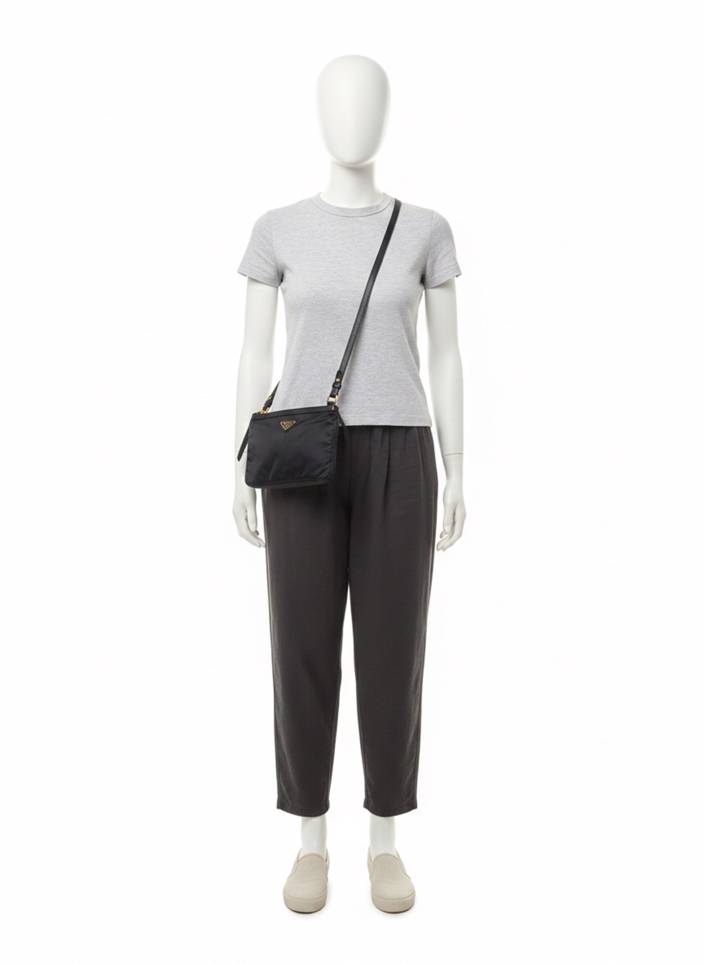 Prada Black Nylon Crossbody Bag (Category: Luxury Bags & Wallets) located in Quezon City. Submitted by bagbuddies.mnl (Listing ID 1420751257, Image 2). Description: Prada Bandoliera Tessuto Nylon Soft Calf Trim Black Crossbody Bag 1BH046, Black, Small 7.5/10 📌No inclusions Php 19.5k only.