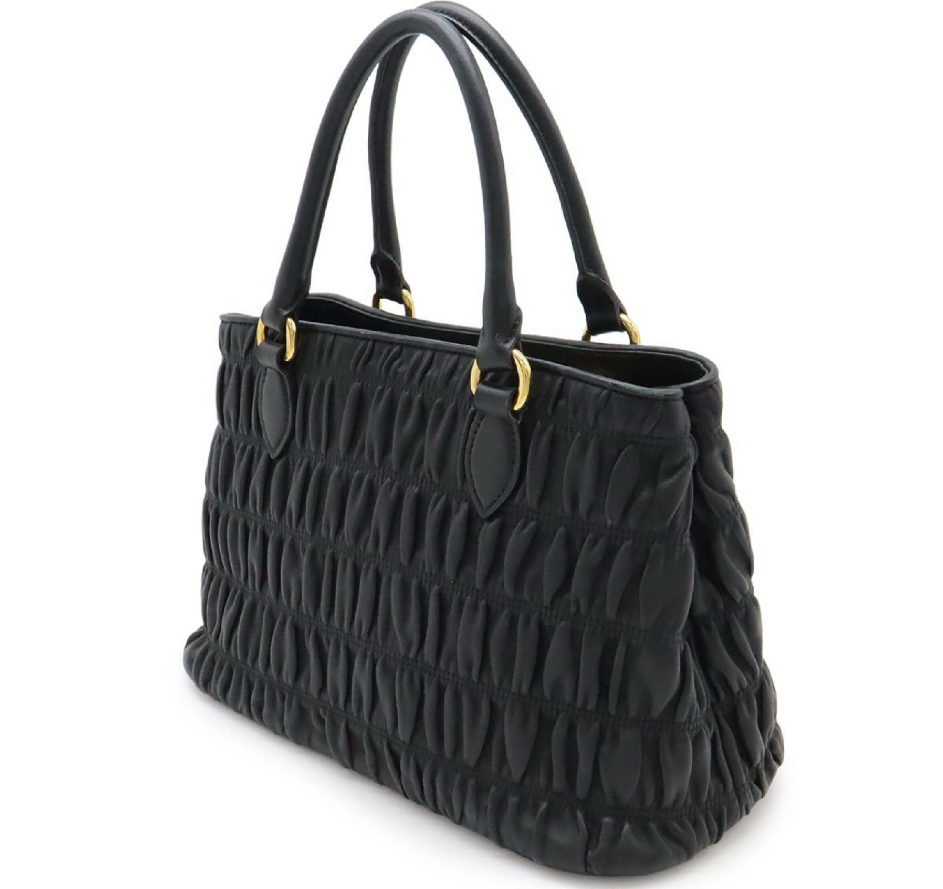Prada Gauffre Leather Handbag Black GHW (Category: Luxury Bags & Wallets) located in Las Pinas. Submitted by daisuki_japan_luxury_by_reiko (Listing ID 1420809440, Image 2). Description: No strap included On hand Japan/In-store/Pre-Order We have weekly shipping schedule via pabitbit. But please expect delays as flights may be cancelled due to unforeseen circumstances. Please refrain from asking BIG discounts. Also please make it a habit to read th