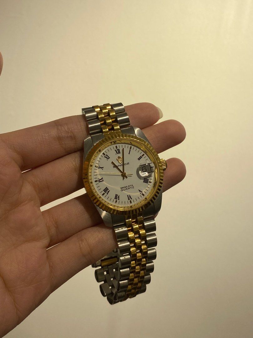 Sandoz Two Toned Datejust Roman Numeral (Category: Luxury Watches) located in Manila. Submitted by xodyd (Listing ID 1420901797, Image 1). Description: For Sale: Sandoz Datejust Two Toned Watch for Men - quartz - sapphire crystal covering; no scratches - 37mm diameter, 20mm lugs - comes with box - no issues rfs: selling for my dad because he's decluttering dm for more info!.