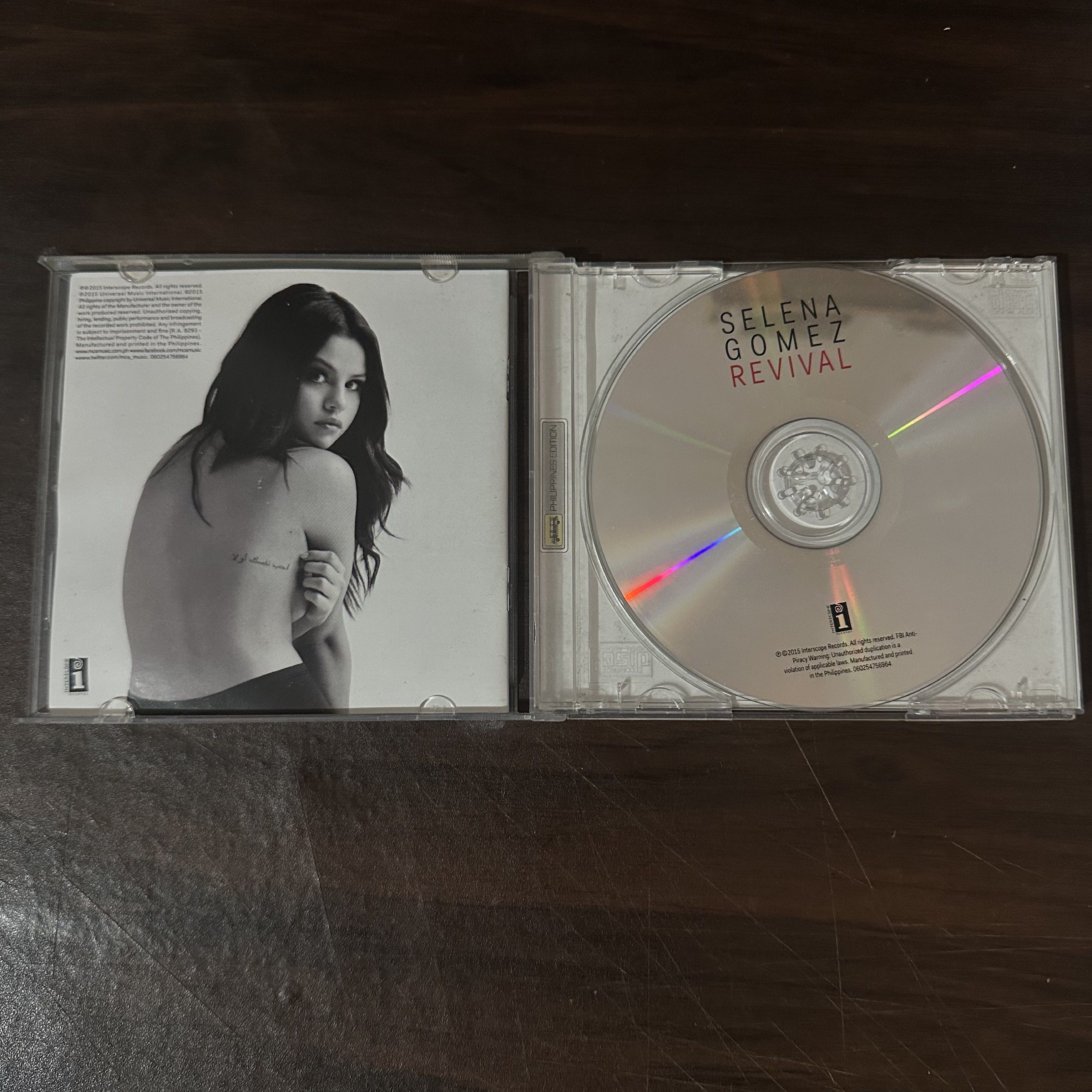 Selena Gomez Revival CD (Category: CDs & DVDs) located in Tuguegarao City. Submitted by heartdeclutters (Listing ID 1420854311, Image 3). Description: - Selena Gomez "Revival" CD - Features the album cover and tracklist - Includes popular songs: "Good For You", "Same Old Love", and more! - CD is in its original case.