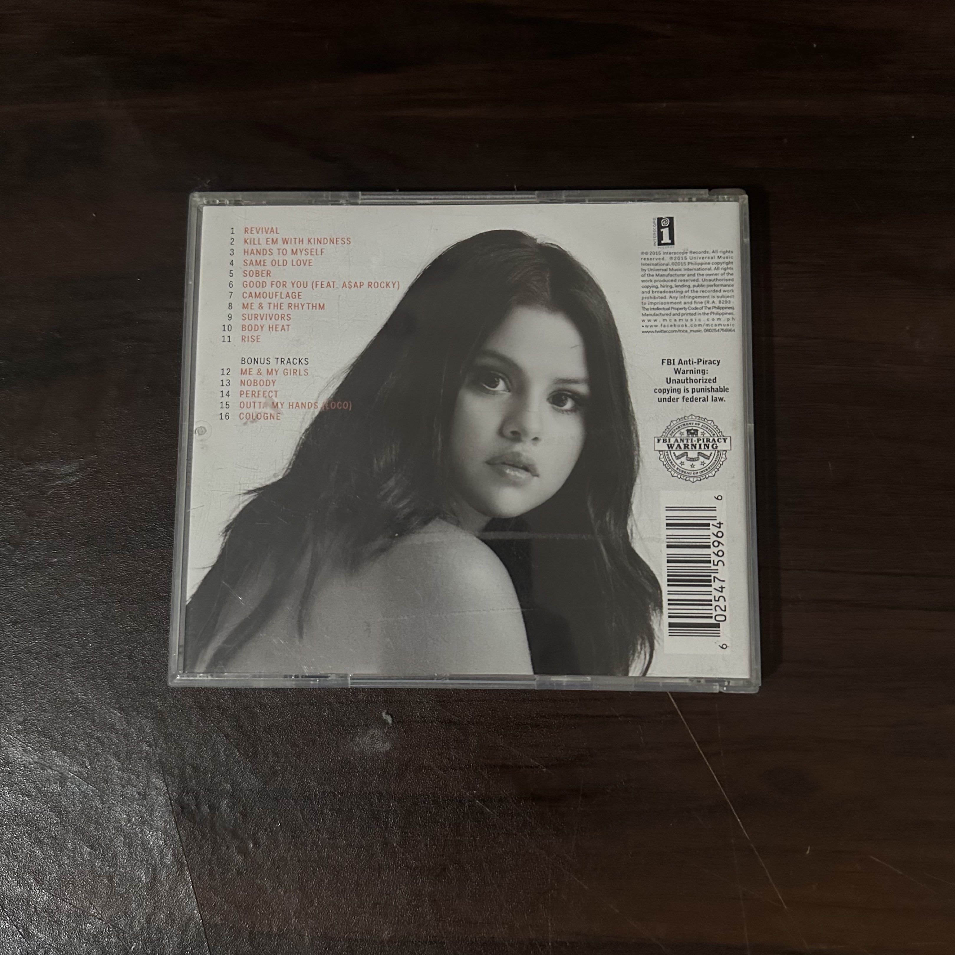 Selena Gomez Revival CD (Category: CDs & DVDs) located in Tuguegarao City. Submitted by heartdeclutters (Listing ID 1420854311, Image 2). Description: - Selena Gomez "Revival" CD - Features the album cover and tracklist - Includes popular songs: "Good For You", "Same Old Love", and more! - CD is in its original case.