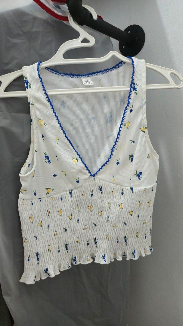 SHEIN Tops Collection (Category: Sleeveless) located in Pasig City. Submitted by deeeclutters (Listing ID 1420903829, Image 3). Description: - SHEIN Tops Collection - Various styles and colors - Includes tops in blue, red, and brown - Size: XS/EU 34/UK 6/US 2 - Php 300 per top. -Php 950 for all 4..