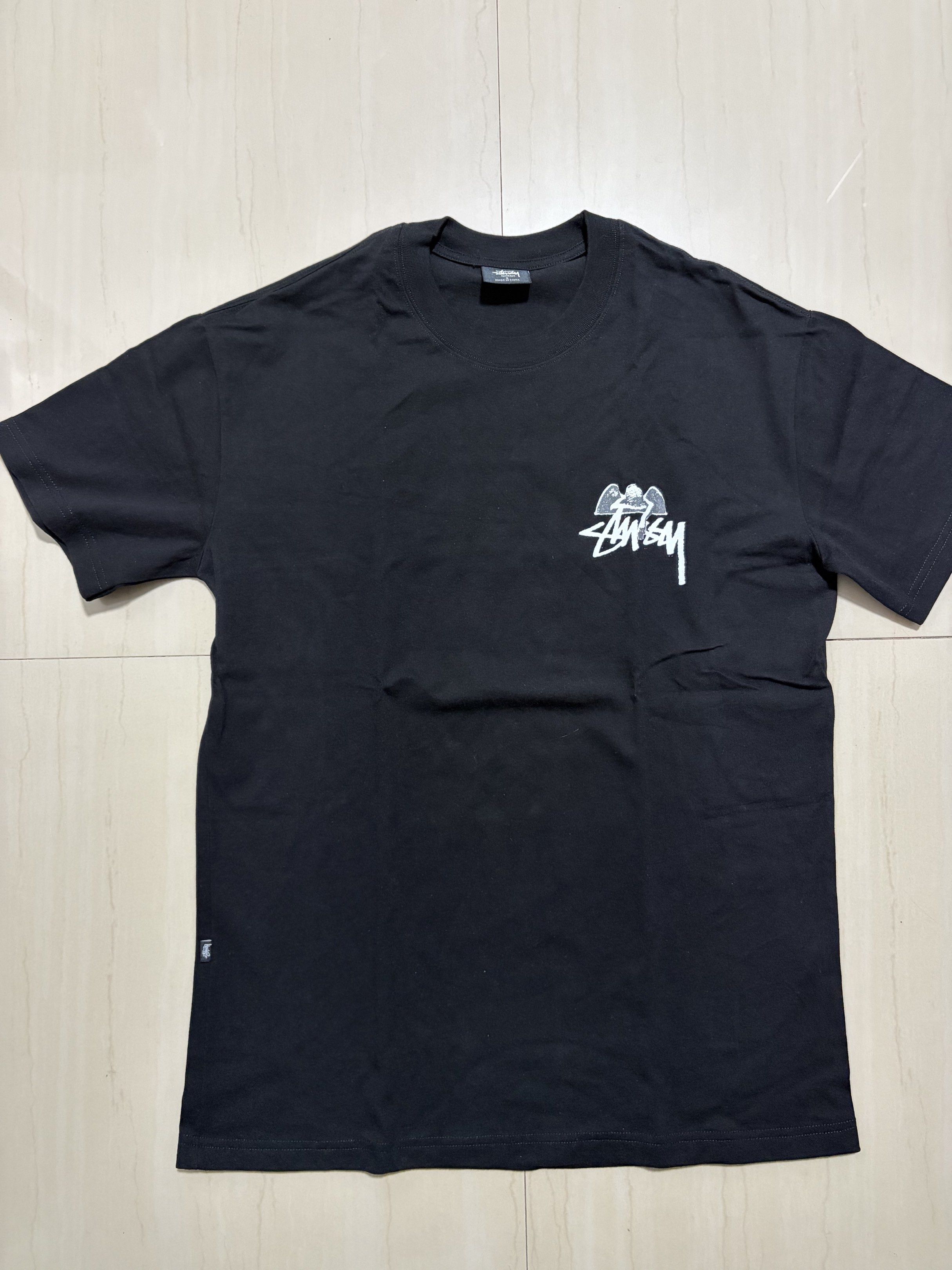 Stussy Angel 8 Ball Tee - Black (Category: Tshirts & Polo Shirts ) located in Cavite. Submitted by _dashhh (Listing ID 1420746997, Image 1). Description: - Size: S - Used once - Bought from Taiwan (Not Orig) - Width - 20 Length - 29 - Rfs: too big for me .