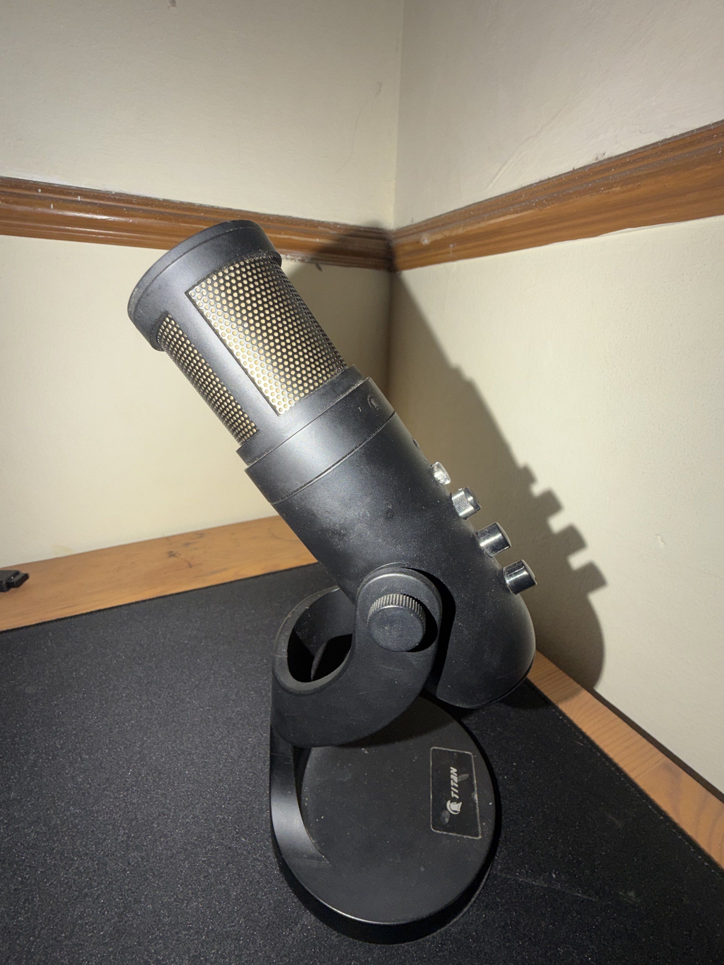 Titan USB Microphone (Category: Microphones) located in Manila. Submitted by khaazzii11 (Listing ID 1420837236, Image 1). Description: - Titan USB microphone - Adjustable volume and echo controls - Built-in stand - Black finish - Mesh grill - Clear audio recording - Suitable for various applications - Touch mute - RGB.