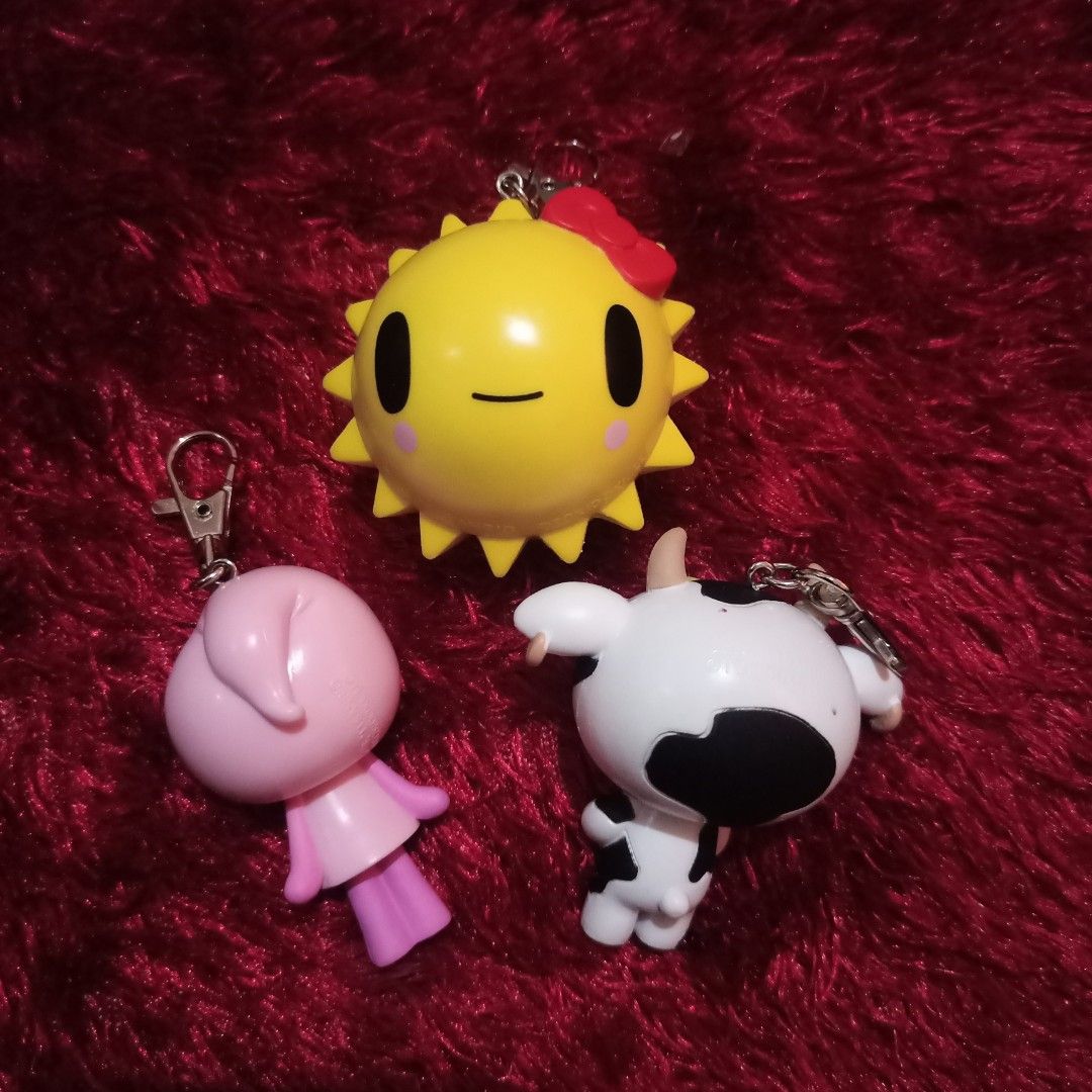 Tokidoki x Sanrio Hello Kitty Keychain (Category: Character Goods) located in Taguig. Submitted by oddlykawaiishop.ph (Listing ID 1420900435, Image 2). Description: 🎀 What you see is what you get—please check photos for details! • Pink HK, 170php (AVAILABLE) • Sun HK, SOLD • Cow HK, SOLD Note: Cow HK has a dot at the back of its head...other than that it's all good 👍.