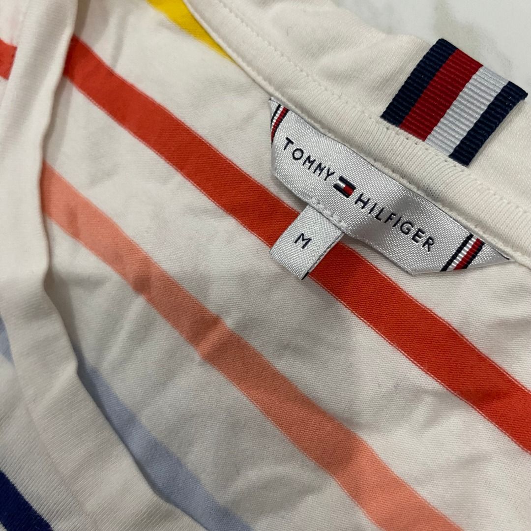 Tommy Hilfiger Striped T-shirt (Category: Others Tops) located in San Fernando. Submitted by deku_off (Listing ID 1420889361, Image 3). Description: - Tommy Hilfiger striped t-shirt - Crew neck - Short sleeves - Features the Tommy Hilfiger logo - Made of soft, comfortable material - Versatile for casual wear.