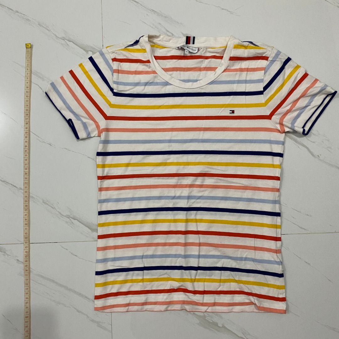 Tommy Hilfiger Striped T-shirt (Category: Others Tops) located in San Fernando. Submitted by deku_off (Listing ID 1420889361, Image 1). Description: - Tommy Hilfiger striped t-shirt - Crew neck - Short sleeves - Features the Tommy Hilfiger logo - Made of soft, comfortable material - Versatile for casual wear.