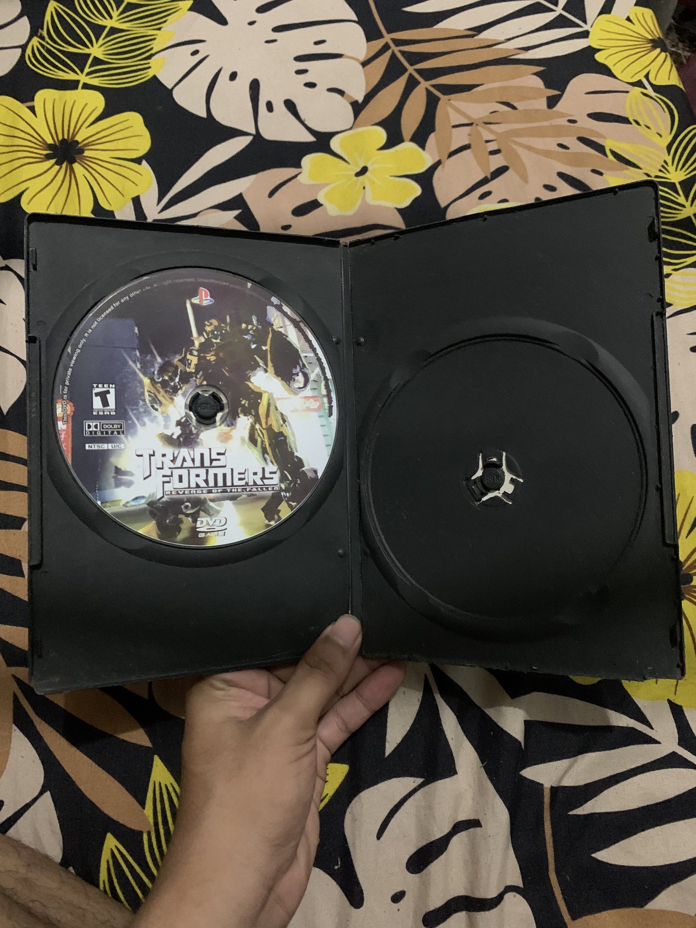 Transformers: Revenge of the Fallen - PS2 (Category: PlayStation) located in Manila. Submitted by declutteringog7 (Listing ID 1420843310, Image 3). Description: - Transformers: Revenge of the Fallen for PlayStation 2 - Includes game disc and case - Rated T for Teen - Case has some wear and tear - DVD game.