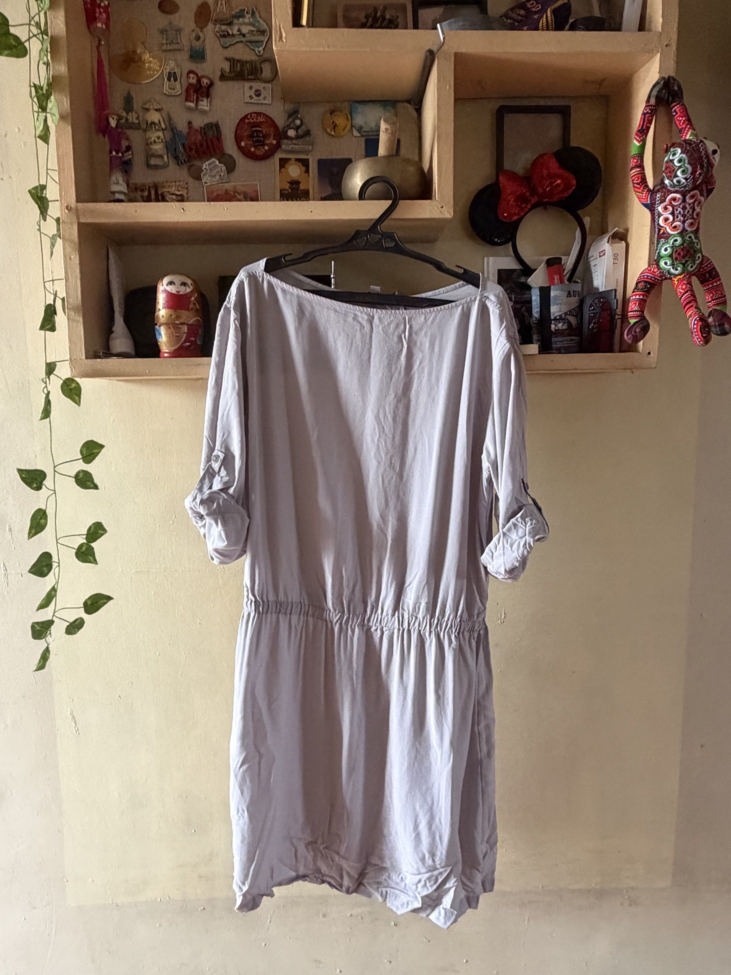 Uniqlo Dress - Size L (Category: Dresses) located in Manila. Submitted by fcd2410 (Listing ID 1420758725, Image 2). Description: - Uniqlo light grey dress - Size: L - Features: - Boat neck - Elastic waist - 3/4 sleeves (rollable with button) - Made in China.