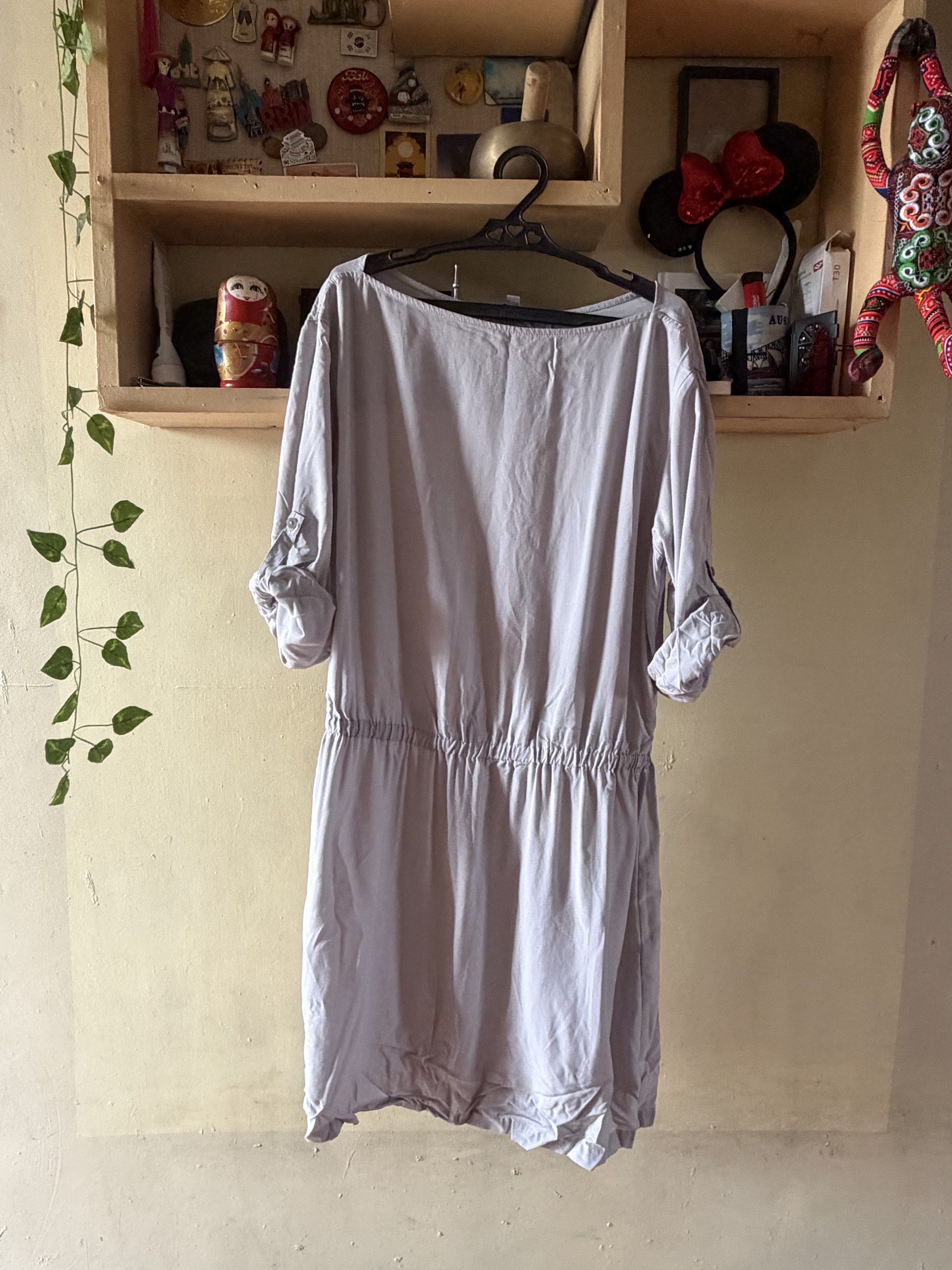 Uniqlo Dress - Size L (Category: Dresses) located in Manila. Submitted by fcd2410 (Listing ID 1420758725, Image 1). Description: - Uniqlo light grey dress - Size: L - Features: - Boat neck - Elastic waist - 3/4 sleeves (rollable with button) - Made in China.