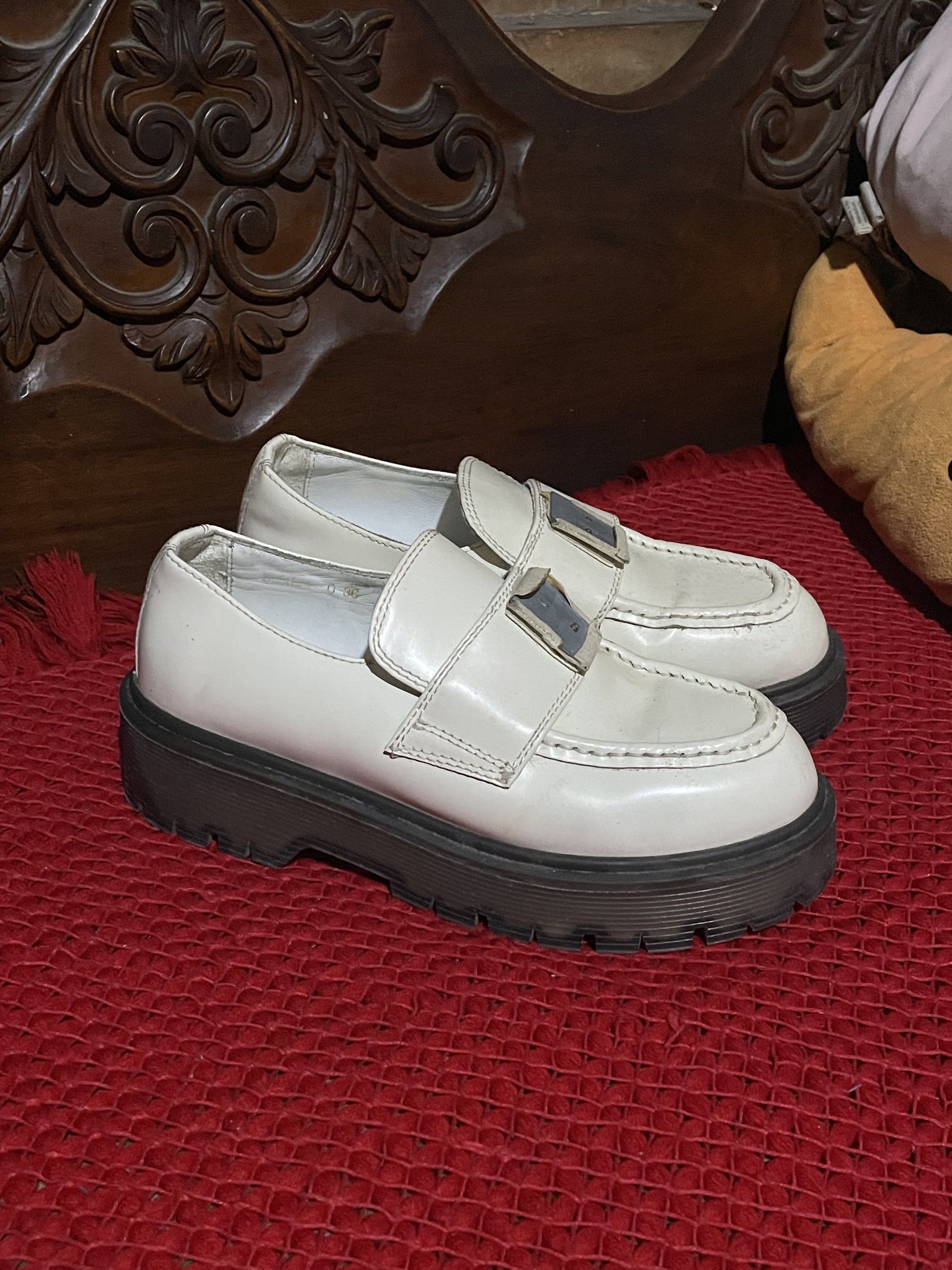 Valentino Garavani White Platform Loafers (Category: Loafers) located in Manila. Submitted by erickalago (Listing ID 1420890247, Image 2). Description: - Valentino Garavani platform loafers - White leather upper - Chunky black sole - Silver buckle detail - Made in Italy - Size 36 - Visible Valentino logo on insole - Soles show wear issue: wala yung charm niya sa gitna NEGOTIABLE, PM LANG ^^ location: san andres, granate.