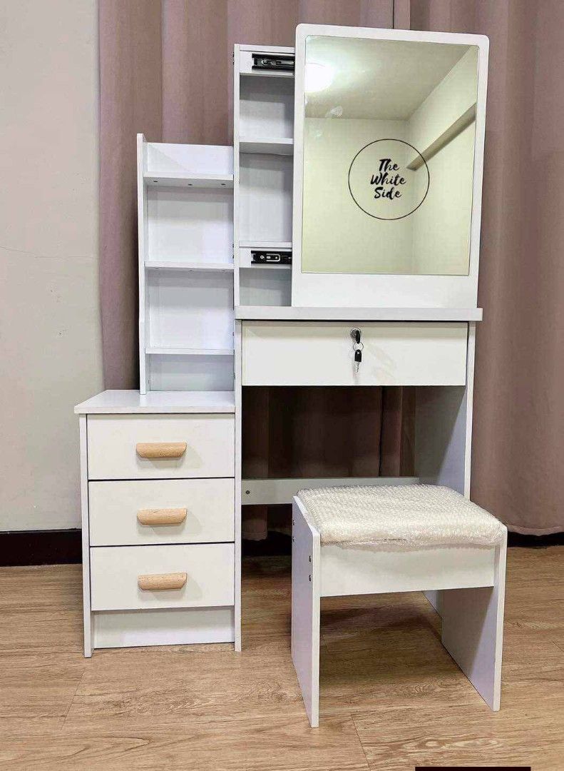 Vanity Table with Mirror and Stool (Category: Tables & Sets) located in Taguig. Submitted by diannecaya86853 (Listing ID 1420898511, Image 3). Description: - Vanity table set includes table, mirror, and stool. - Features multiple drawers and shelves for storage. - Stool has a cushioned seat. - Available colors: Brown, Pink, White. - Ideal for bedrooms and dressing areas..