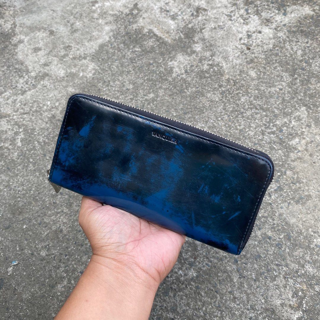 Vanquish Long Wallet (Category: Wallets & Card holders) located in Calamba. Submitted by thriftguide (Listing ID 1420793563, Image 1). Description: Vanquish Long Wallet Authentic Excellent Condition Minor Flaw: Mild Scratches but not visible due to design.