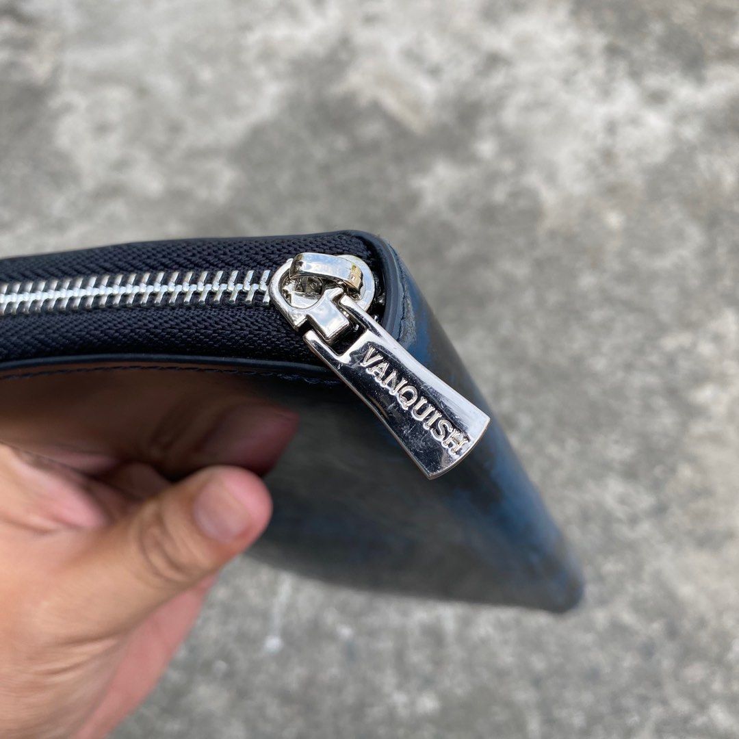 Vanquish Long Wallet (Category: Wallets & Card holders) located in Calamba. Submitted by thriftguide (Listing ID 1420793563, Image 3). Description: Vanquish Long Wallet Authentic Excellent Condition Minor Flaw: Mild Scratches but not visible due to design.