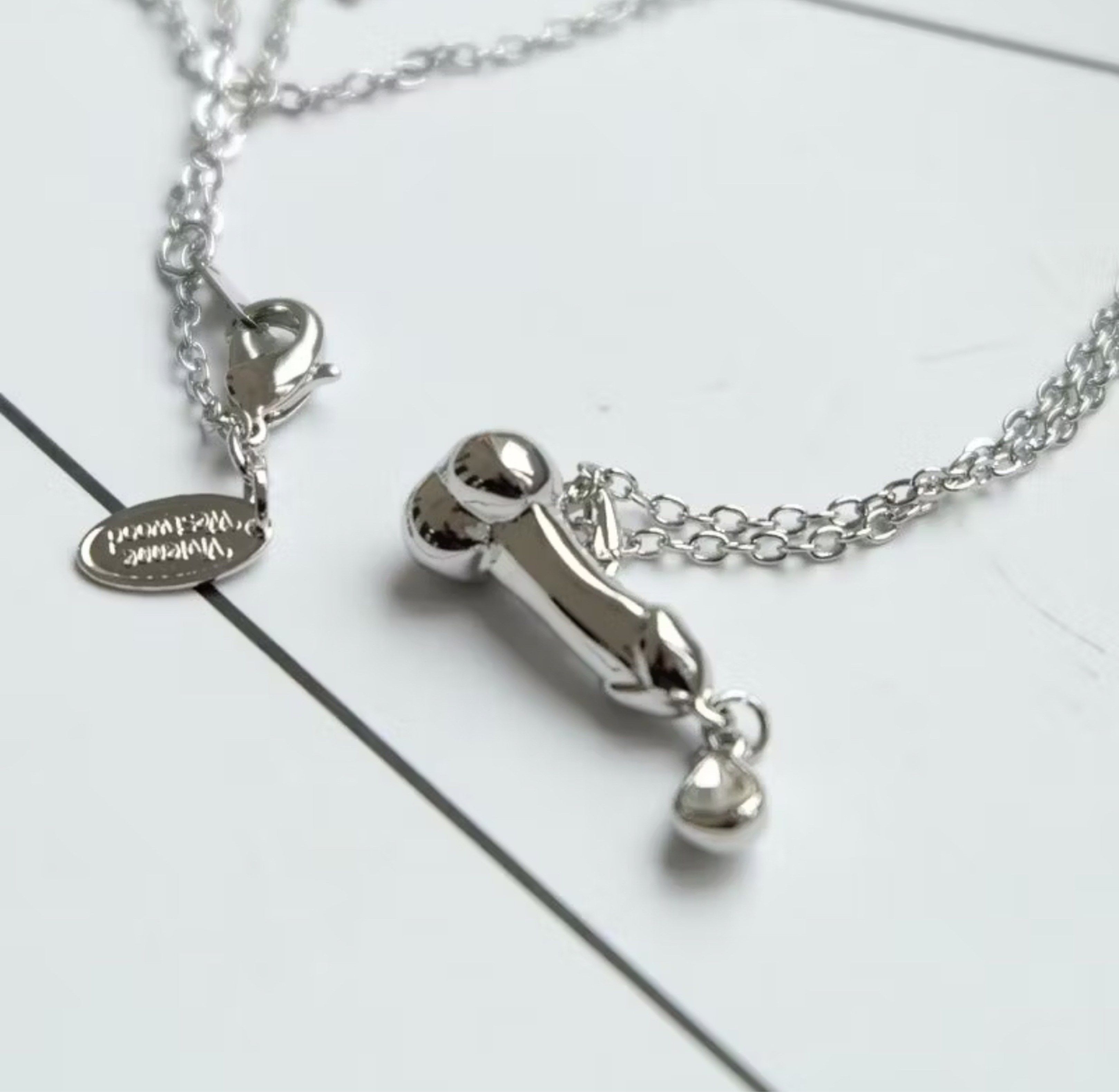Vivienne Westwood Necklace (Category: Luxury Accessories) located in Calamba. Submitted by apppp_117 (Listing ID 1420916277, Image 1). Description: - Vivienne Westwood necklace - Distinctive design - Silver color - A unique accessory - Unique and eye-catching design - Pre-order item - Shipping time: 7-14 days.