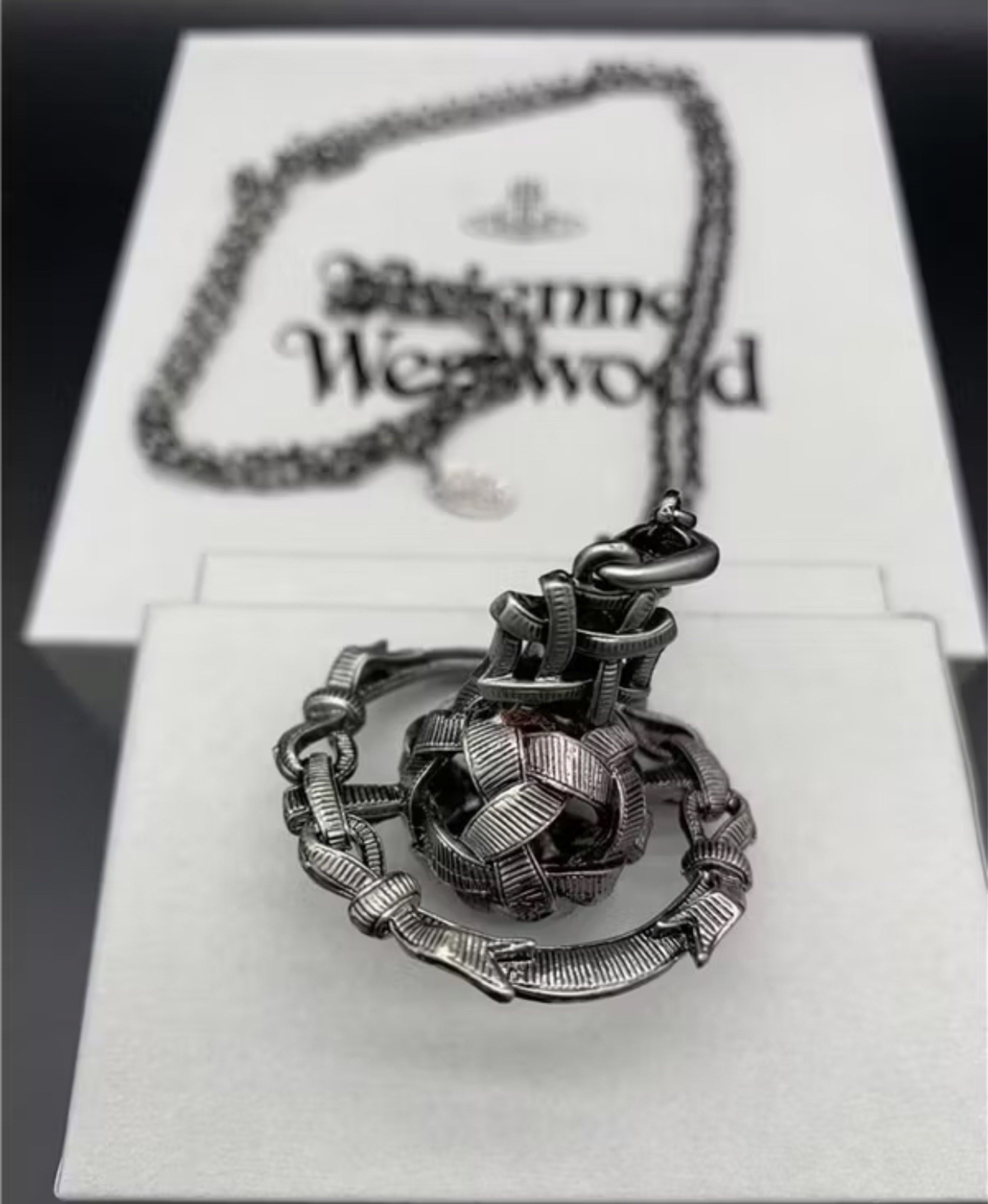 Vivienne Westwood Orb Necklace (Category: Luxury Accessories) located in Calamba. Submitted by apppp_117 (Listing ID 1420916519, Image 1). Description: - [Brand Name] [Model Name] - [Color] available - Stylish design - Made with durable material - Unique and eye-catching design - Pre-order item - Shipping time: 7-14 days.