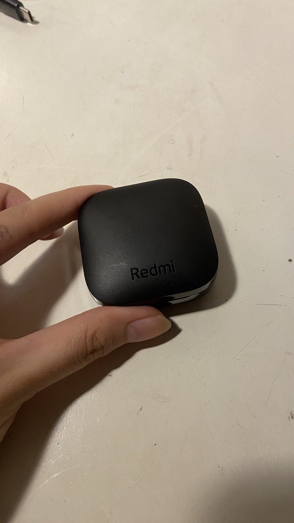 Xiaomi Redmi Wireless Earbuds 6 Active (Category: Earphones) located in Manila. Submitted by cl3m3nt1n3_555 (Listing ID 1420871878, Image 3). Description: - Black Redmi earbuds w charging case and charging cord - Square charging case with Redmi logo - White light indicator on the case - Product information on the case bottom - used once - rfs: i dont use it. napanalunan ko lang sa xmas party - loc: qc.