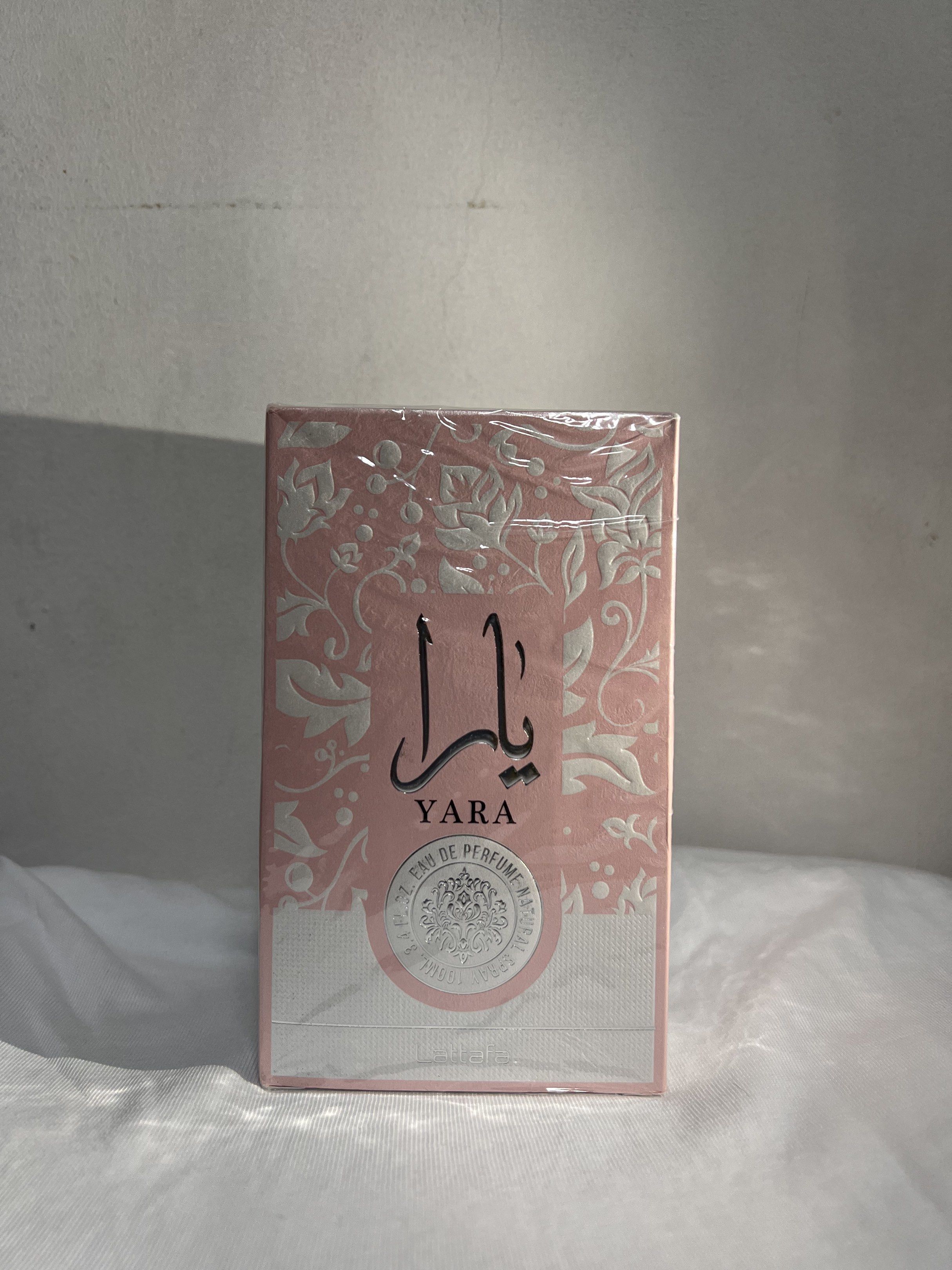 Yara Perfume by Lattafa (Category: Fragrance & Deodorants) located in Manila. Submitted by jeud_8 (Listing ID 1420932626, Image 2). Description: - Brand new, sealed box of Yara perfume by Lattafa. - Features a pink and silver box with elegant Arabic script. - Authentic product, made in the U.A.E. - Expiration date: July 2030. - For external use only..