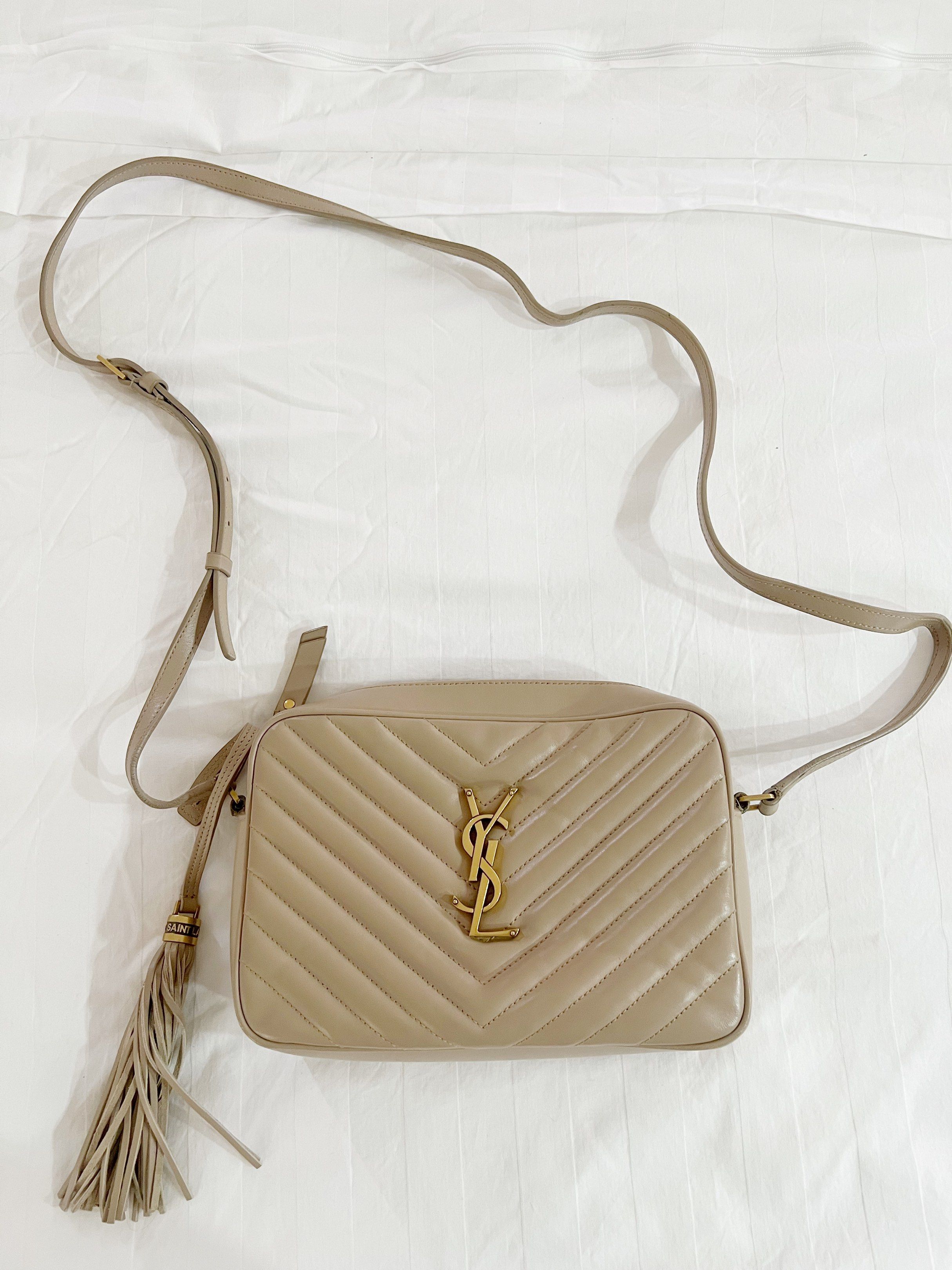 YSL Lou Cross body sling (Category: Cross-body Bags) located in Paranaque City. Submitted by karchim (Listing ID 1420764539, Image 1). Description: Authentic YSL Lou sling bag Bought in Hawaii Complete with box and dust bag Pre loved but like new No discoloratipn, also in good condition Rfs: decluttering.
