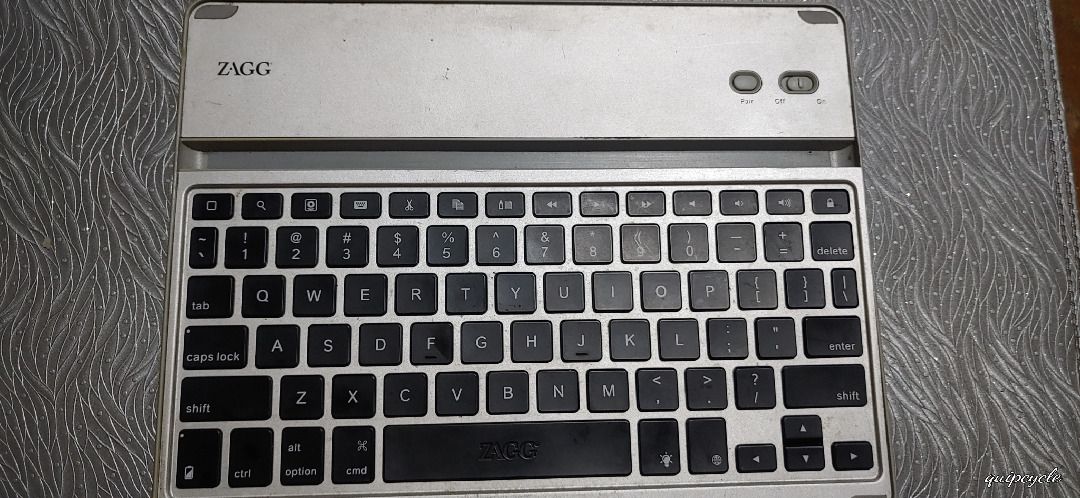 ZAGG Bluetooth Keyboard for iPad 10.2 (Category: Computer Keyboard) located in Quezon City. Submitted by ppaya (Listing ID 1420861504, Image 1). Description: - ZAGG tablet keyboard - Full keyboard layout - Black keys - Silver frame - No issues. - Designed for iPad 10.2 inch 7th and 8th generation - Can also be paired with ANDROID Tablets.
