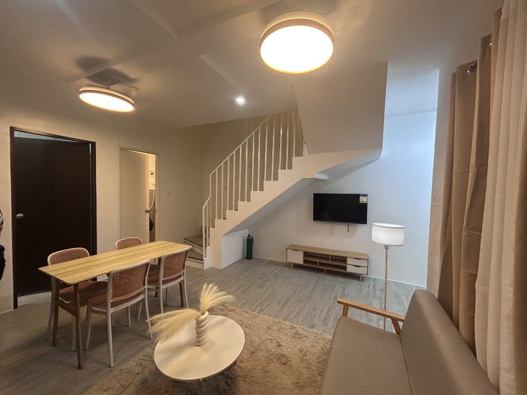 3 bedroom NUVALI - interior designed house (Category: Townhouse) located in Manila. Submitted by unboxing_addict (Listing ID 1420951386, Image 2). Description: ☘️Cozy interior designed 🏡house for rent in Nuvali -Amaia Townhouse by Ayala Land prime house across pool 🏊🏼‍♂️ and 🏀 basketball court 🍃very airy and has open view🌄 3 bedroom complete with aircon and ceiling fan 2 toilet and bath with heater parking 1-2 cars 🚘 *sorry, no pets allowe