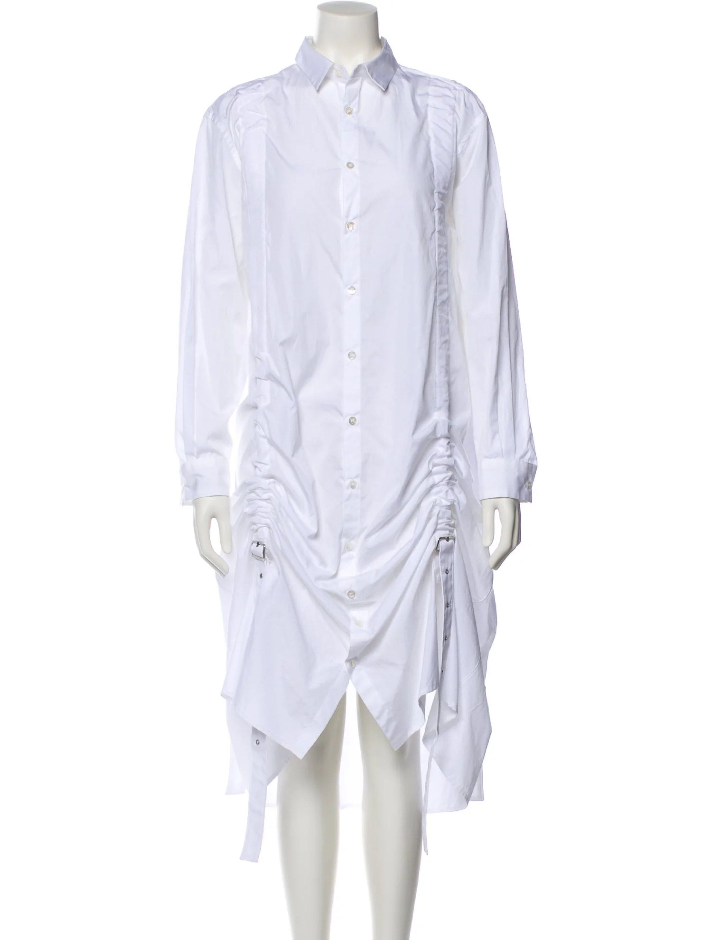 $645 COMME DES GARÇONS Noir Kei Ninomiya Shirt Dress in White SHW Authentic CDG US 6 (Category: Luxury Apparel) located in Quezon City. Submitted by kayes_closet (Listing ID 1421004739, Image 3). Description: Kei Ninomiya’s designs, particularly under the Comme des Garçons umbrella, are known for their architectural construction and innovative techniques. This shirt dress highlights unique detailing such as the vertical fabric straps running down