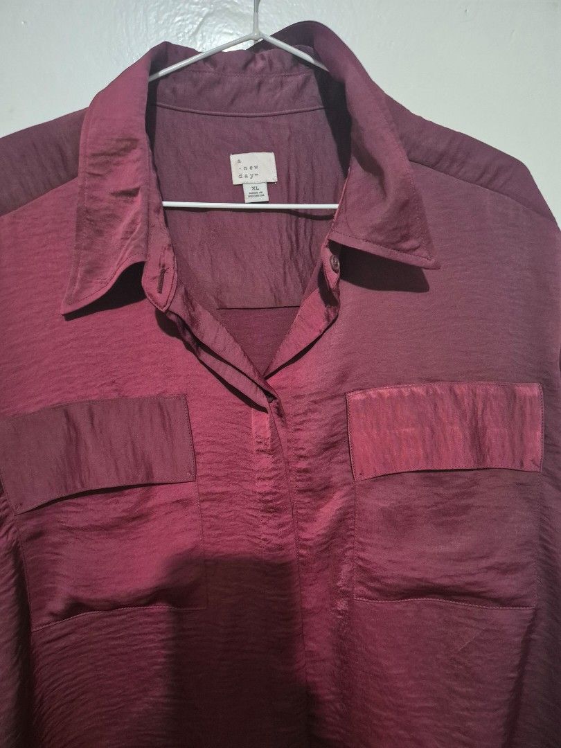 A New Day Maroon Blouse (Category: Blouses) located in Quezon City. Submitted by conchicken (Listing ID 1421089180, Image 2). Description: - Brand: A New Day - Color: Maroon - Features: Collared neckline, two chest pockets, long sleeves with buttoned cuffs - Fabric: Textured - Closure: Button-down front - xl to xxl plus size semi crop.