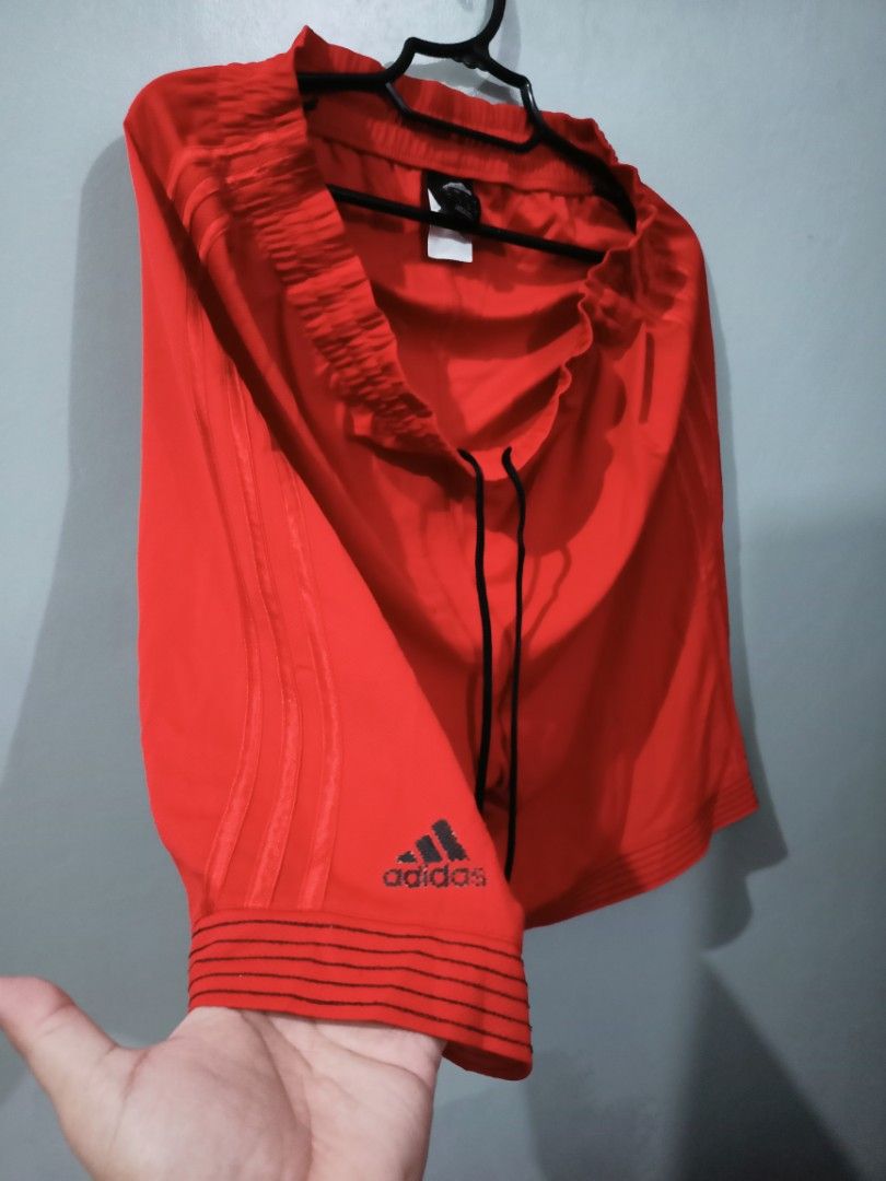 Adidas Red Shorts (Category: Activewear) located in Rosales. Submitted by brandeduseditems (Listing ID 1421043632, Image 2). Description: - Adidas red shorts - Size: XL - Drawstring waist - Adidas logo on left leg - Comfortable, loose fit - Genuine 100% In good condition..