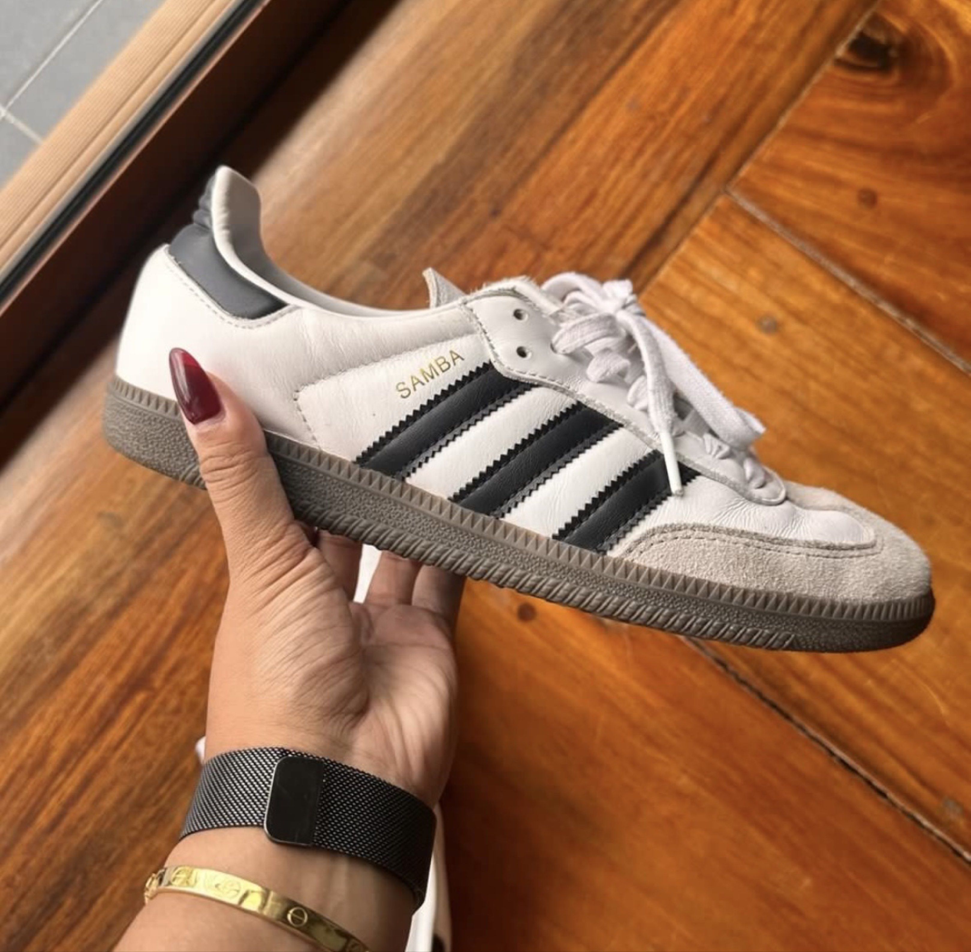 Adidas Samba White Black Sneakers (Category: Sneakers) located in Tarlac. Submitted by airam__ (Listing ID 1421093996, Image 3). Description: - Adidas Samba sneakers - White leather upper with black stripes - Grey suede toe cap - Brown sole - Size: UK 7, US 7.5, FR 40, JP 255, CHN 245 - Made in Vietnam - Features Adidas logo on tongue and insole - White laces - women’s size 8 / men’s size 7.