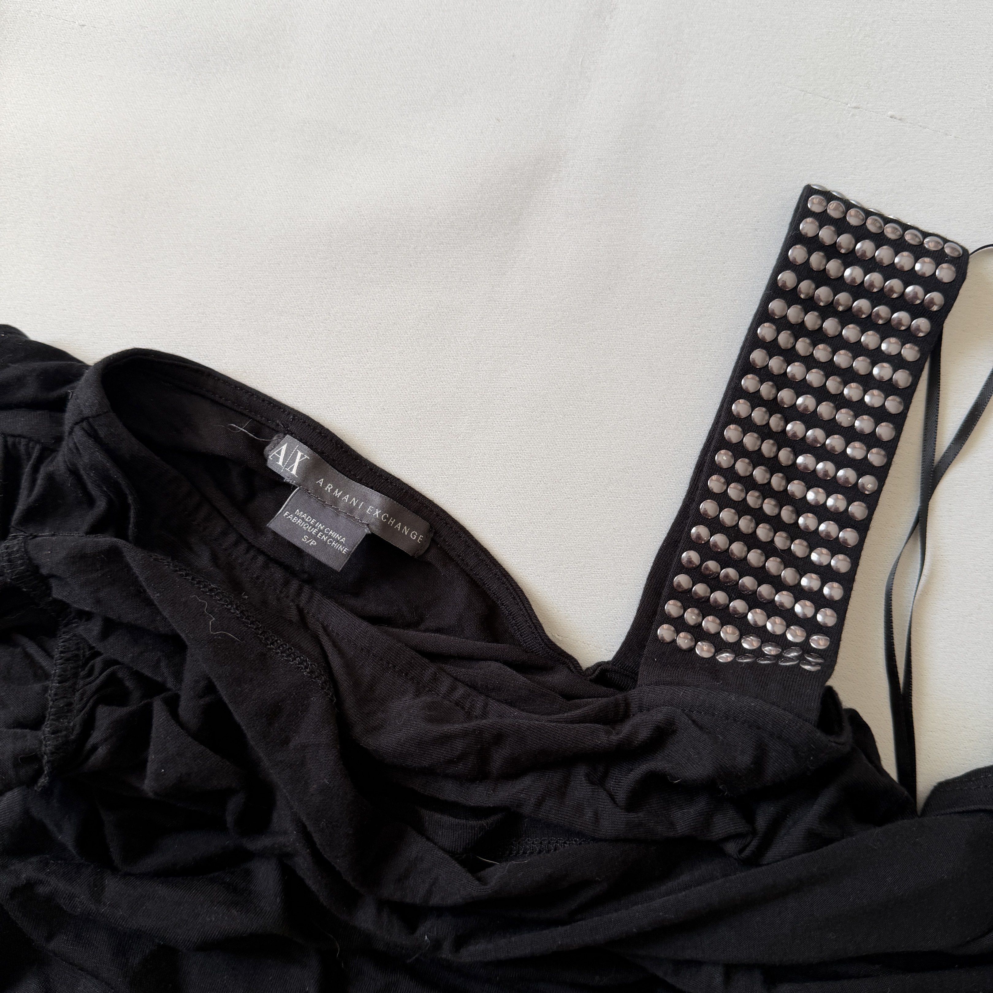 Armani Exchange Studded Shoulder Top / Micro Dress (Category: Sleeveless) located in Binan City. Submitted by rr.stuff (Listing ID 1421024674, Image 2). Description: - Armani Exchange one-shoulder top / micro dress - Studded strap detail - Rarely used, like new No when worn photos. As is. Payment first, no COD. Shipping via J&T, from biñan laguna.