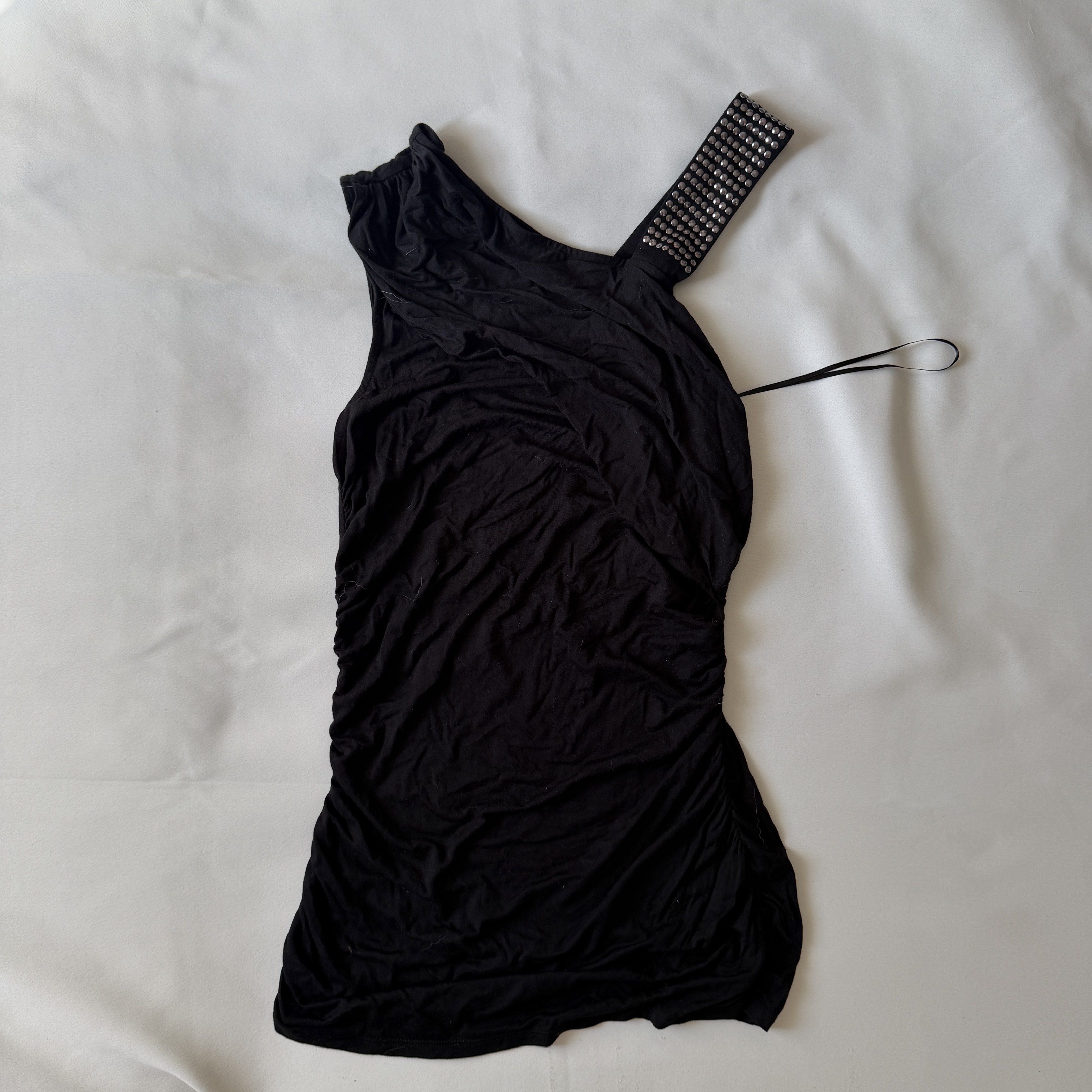 Armani Exchange Studded Shoulder Top / Micro Dress (Category: Sleeveless) located in Binan City. Submitted by rr.stuff (Listing ID 1421024674, Image 1). Description: - Armani Exchange one-shoulder top / micro dress - Studded strap detail - Rarely used, like new No when worn photos. As is. Payment first, no COD. Shipping via J&T, from biñan laguna.