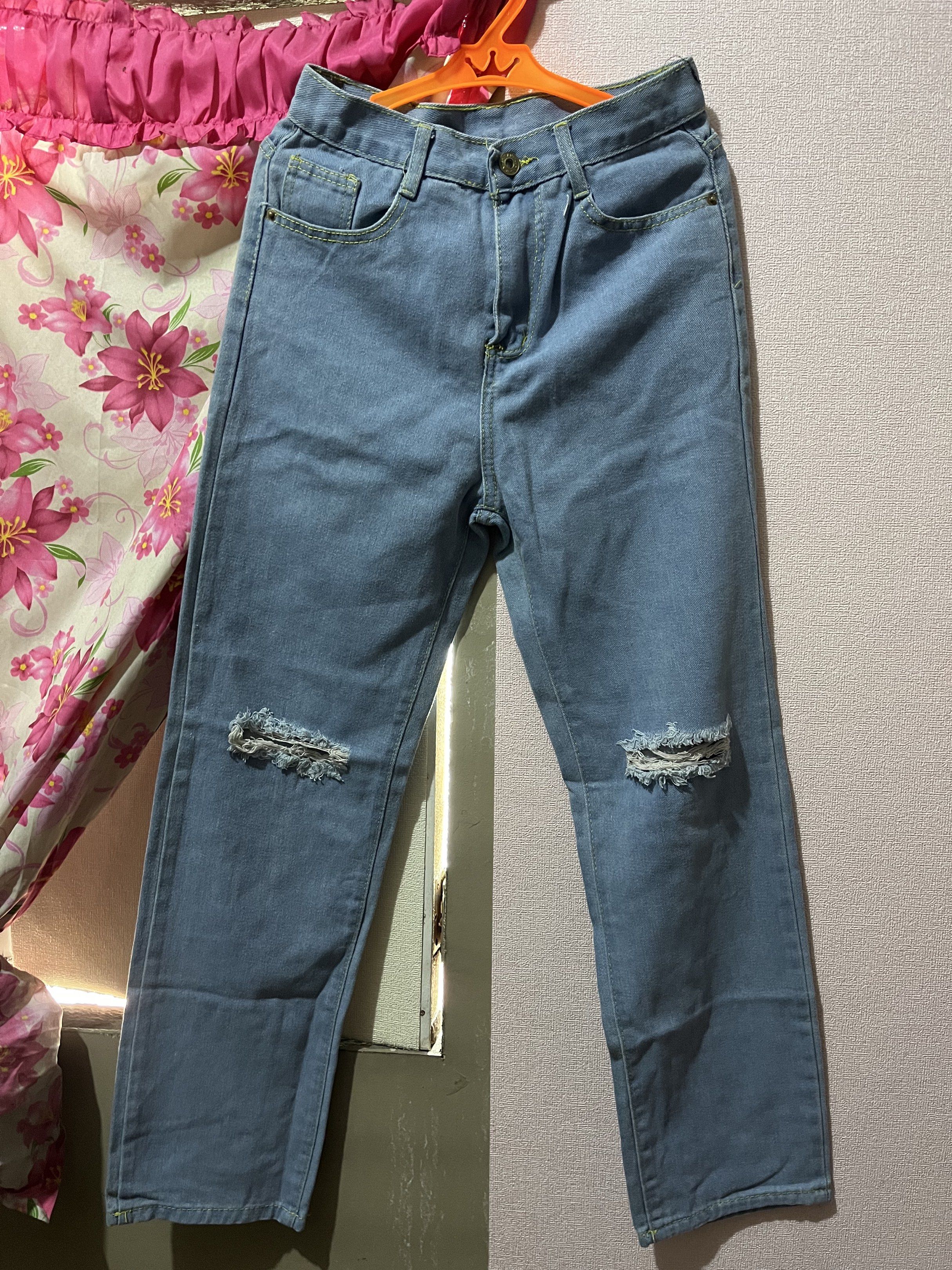 Blue Denim Ripped (Category: Jeans) located in Manila. Submitted by clyssdcc (Listing ID 1420970422, Image 1). Description: - Blue denim ripped jeans - Comfortable - 27 waistline.