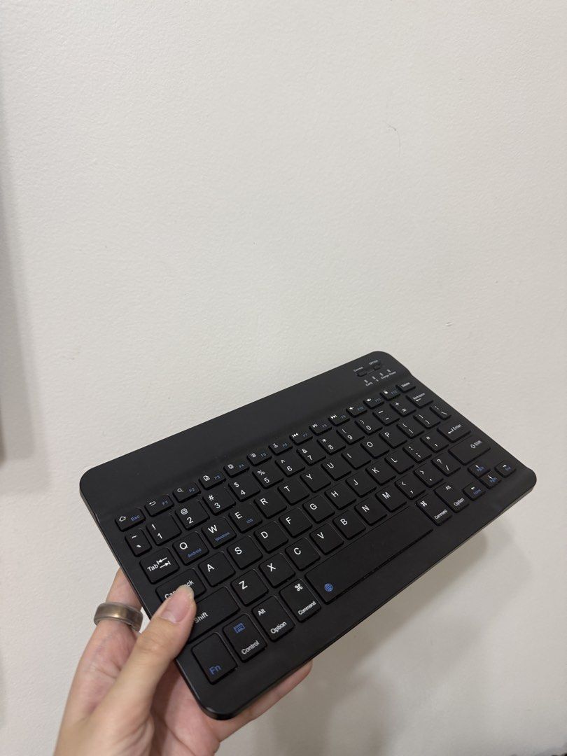 Bluetooth Keyboard (Category: Computer Keyboard) located in Mandaluyong City. Submitted by katstuff (Listing ID 1421084876, Image 1). Description: - Compatible to any laptop or iPad - Barely used Loc: Mandaluyong (can also book from Cubao) .