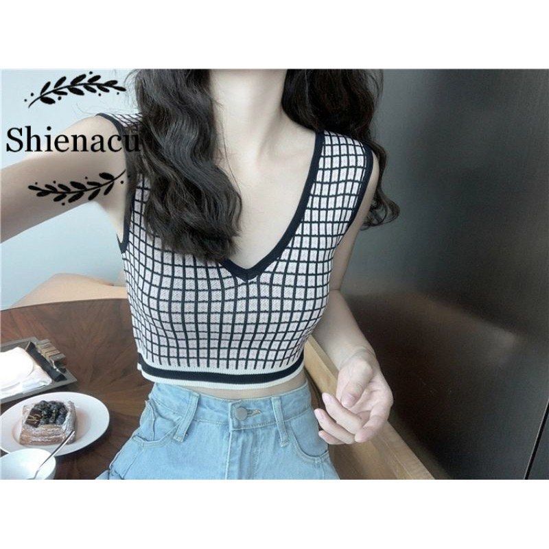 Checkered V-Neck Crop Top (Category: Others Tops) located in Manila. Submitted by _yang2x (Listing ID 1421008174, Image 1). Description: - Checkered crop top - V-neck design - Sleeveless - Cropped length very flattering! never worn bc medyo maluwag sa bust area ko 🥲 .