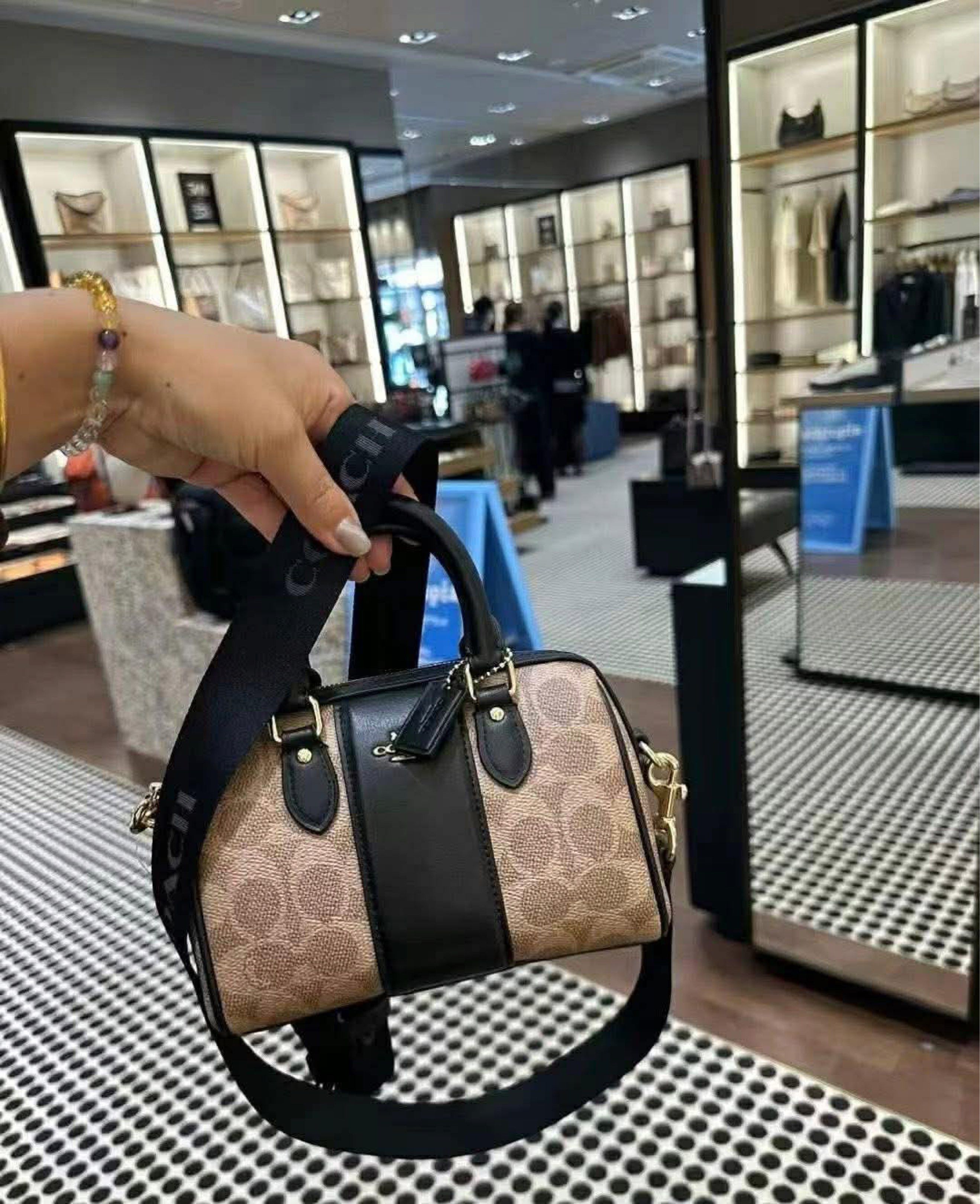 Coach Satchel Crossbody Bag (Category: Luxury Bags & Wallets) located in Manila. Submitted by jay_cee241623 (Listing ID 1421047100, Image 2). Description: - Authentic Coach Satchel crossbody bag - Features the signature Coach print with a black stripe - Detachable crossbody strap included - Comes with dustbag and paperbag - Made in Vietnam - Same-day delivery within Metro Manila via Lalamove (cut-off 2 PM) SUPERSALE COACH BAG 🤩 🖇 3,200 small/3,