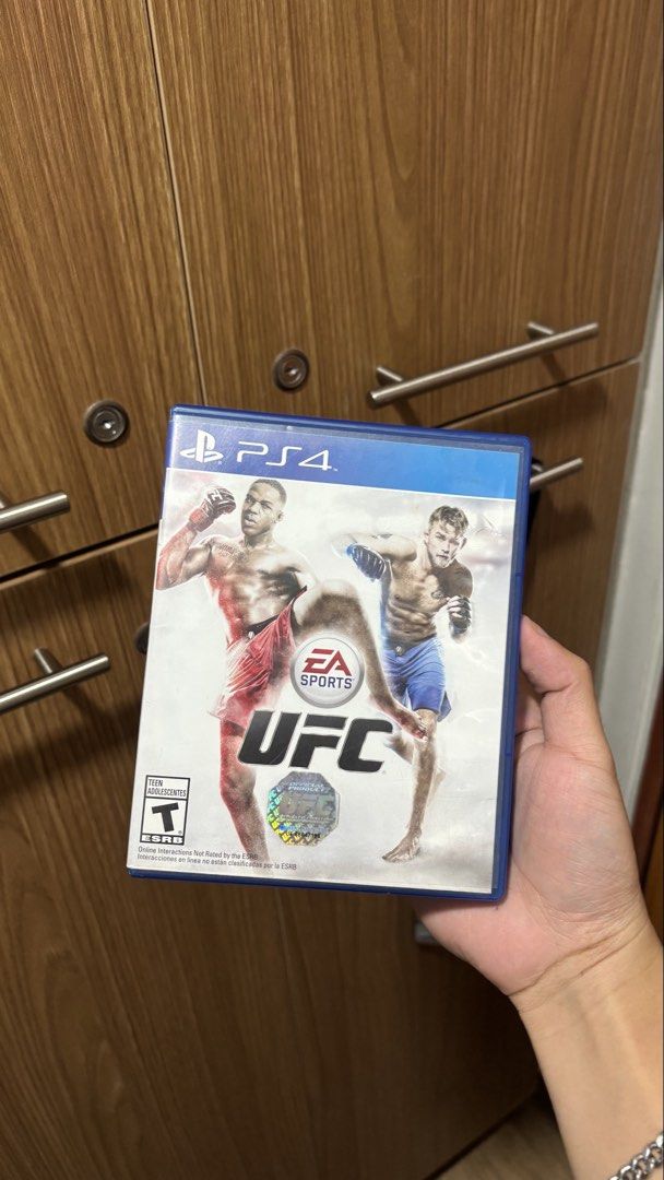 Decluttering Sale 🚨 UFC - PS4 (Category: PlayStation) located in Manila. Submitted by jarrd.xx (Listing ID 1421058415, Image 1). Description: Price is still negotiable.