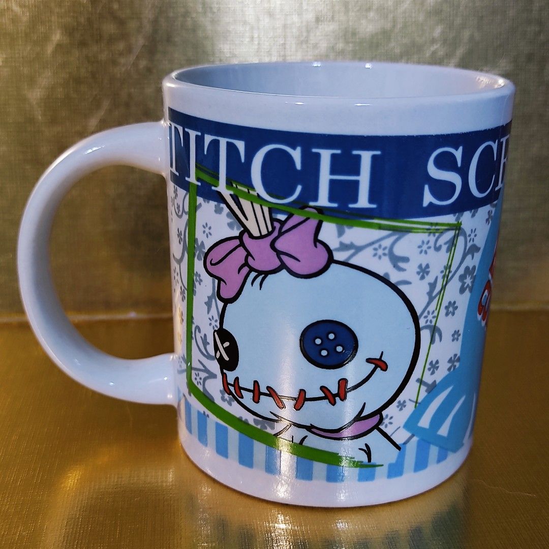 Disney Stitch Mug (Category: Coffee & Tea Tableware) located in Cainta. Submitted by fukunekojapansurplus (Listing ID 1421056352, Image 3). Description: 140 pesos no issue Mug features Stitch from Disney's Lilo & Stitch. It has a white handle and a blue and white design with Stitch and Scrump. The bottom of the mug has the Disney logo. The mug measures approximately 3 inches in diameter and 3.5 inches in height. ✨ A quick Yes or No after inquiry 