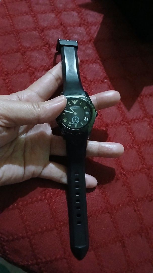 Emporio Armani (Category: Men's Watches) located in Imus. Submitted by dahdahlicious (Listing ID 1421088432, Image 1). Description: - Emporio Armani watch - All-black design - Includes original box - Stylish and ready to wear.