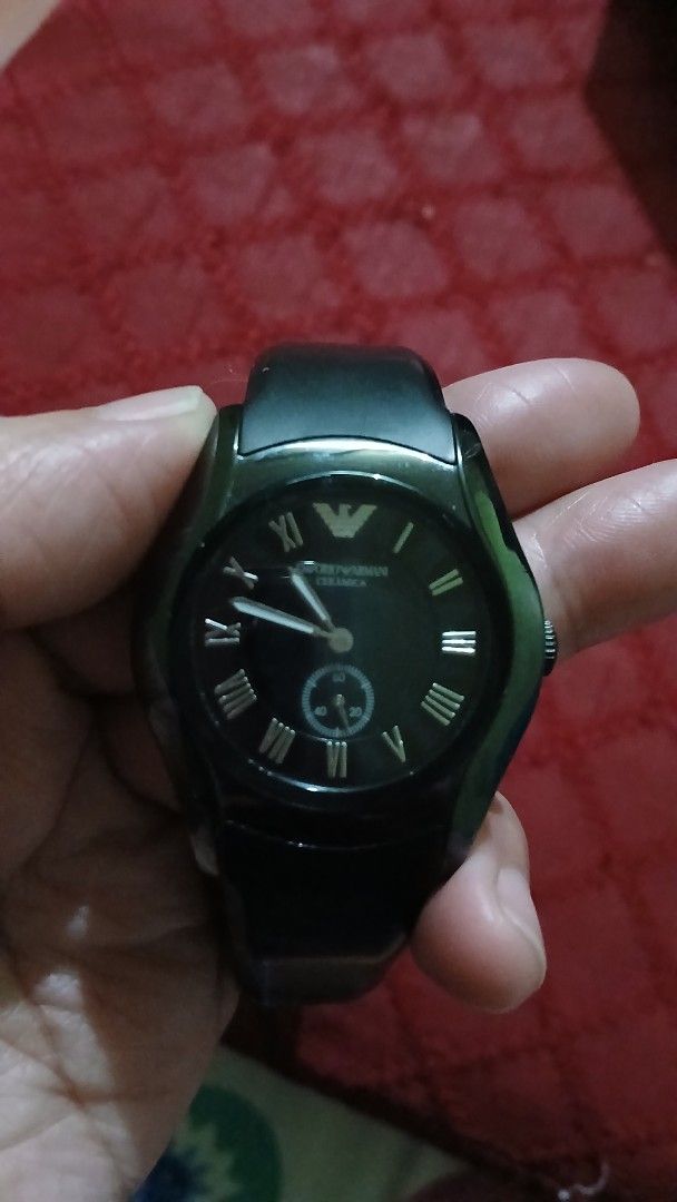 Emporio Armani (Category: Men's Watches) located in Imus. Submitted by dahdahlicious (Listing ID 1421088432, Image 3). Description: - Emporio Armani watch - All-black design - Includes original box - Stylish and ready to wear.