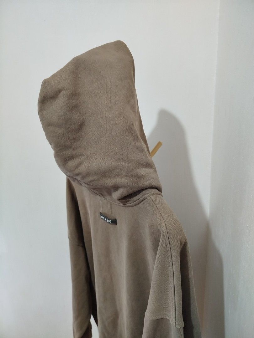 Fear of God Sixth Collection Zip Hoodie (Category: Hoodies) located in Lipa City. Submitted by france01825 (Listing ID 1421055633, Image 3). Description: - Fear of God Sixth Collection Hoodie - Color: Brown - Full zip closure - Attached hood - Two front pockets - Fear of God logo on hood - Branded zipper.