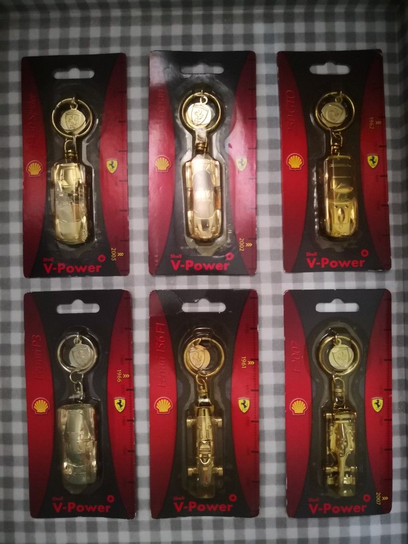 Ferrari Shell V-Power Keychains (Complete Set) (Category: Vintage Collectibles) located in Mandaluyong City. Submitted by ilovemyshop (Listing ID 1420974463, Image 1). Description: - Collectible Ferrari keychains - From Shell V-Power - Gold-colored - Each keychain features a different Ferrari model - Comes in original packaging - Packaging includes Shell V-Power and Ferrari logos - Great for Ferrari enthusiasts and collectors ❤️ @300 each selling