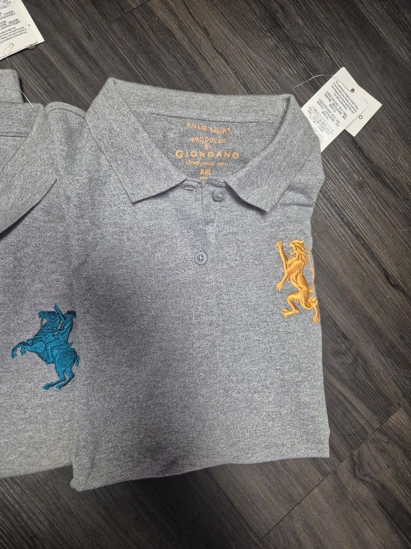 Giordano Polo Shirt XXL (Category: Tshirts & Polo Shirts ) located in Manila. Submitted by cutefinds (Listing ID 1421055366, Image 3). Description: - Giordano polo shirts - Available in gray and teal - Size: XXL - Embroidered horse design - Brand new with tags - Material: Cotton - Perfect for casual wear - Comfortable and stylish.