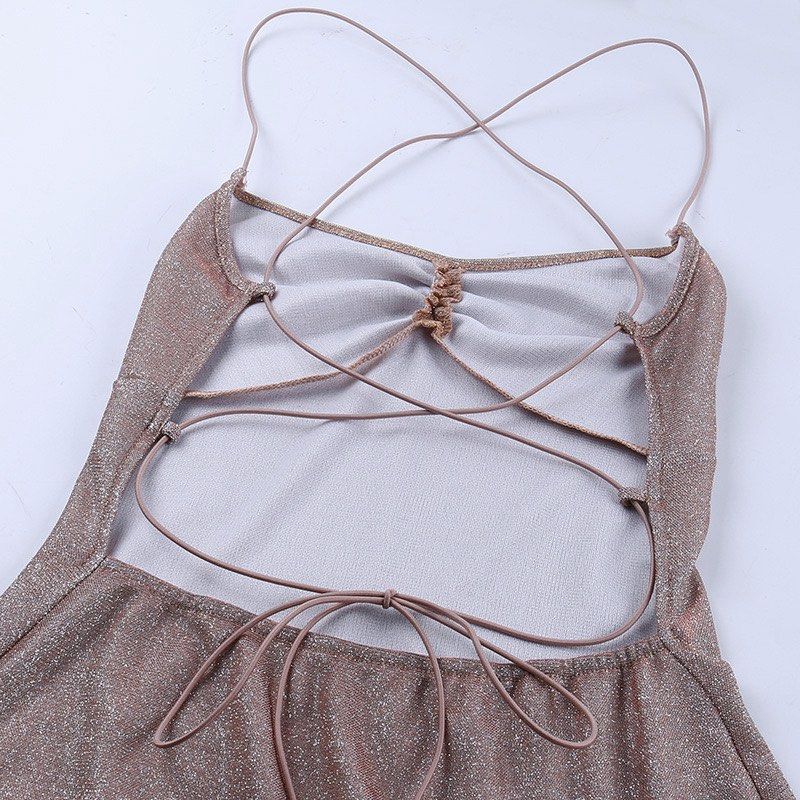 Glittery Asymmetrical Mini Dress (Category: Dresses) located in Manila. Submitted by _yang2x (Listing ID 1421008737, Image 3). Description: - Glittery mini dress - Halter neckline with criss-cross straps - Ruched bust - Asymmetrical hemline with ruffled detail - Tie-up back design - Bodycon style super ganda and flattering!! 😩 for parties or special occasions never worn bc i dont have enough confidence to wear it hahah.