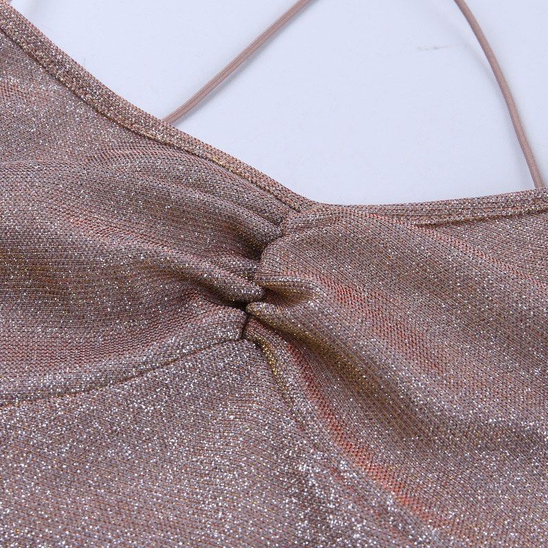 Glittery Asymmetrical Mini Dress (Category: Dresses) located in Manila. Submitted by _yang2x (Listing ID 1421008737, Image 2). Description: - Glittery mini dress - Halter neckline with criss-cross straps - Ruched bust - Asymmetrical hemline with ruffled detail - Tie-up back design - Bodycon style super ganda and flattering!! 😩 for parties or special occasions never worn bc i dont have enough confidence to wear it hahah.