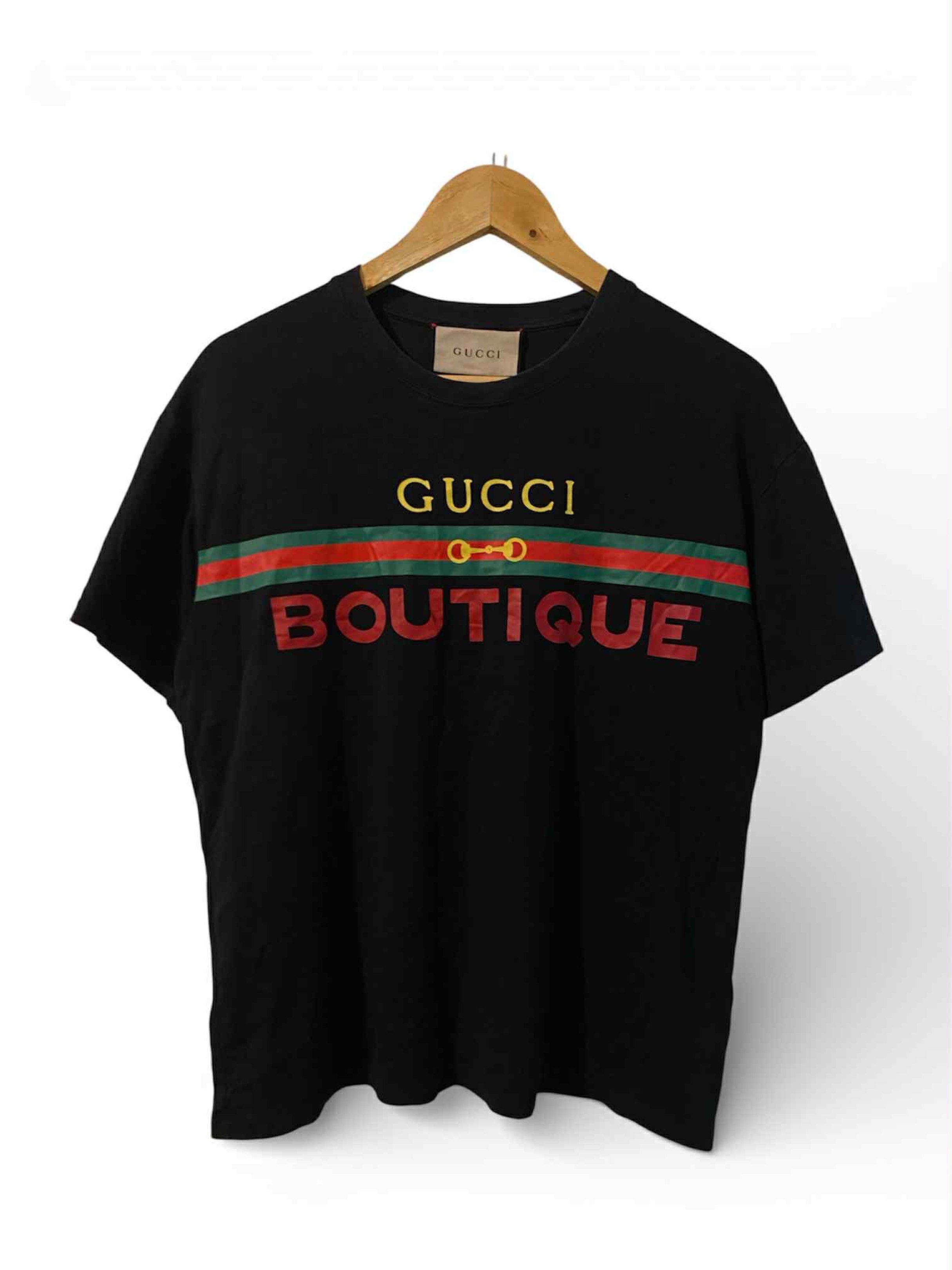 Gucci Boutique Black Shirt (Category: Luxury Apparel) located in Cagayan de Oro. Submitted by timeless.ph (Listing ID 1421041205, Image 1). Description: Size: M Width: 21 Length: 25 Color rate: 9.8/10 Condition: Excellent Issue: Plus shipping fee *color may vary due to lighting*.